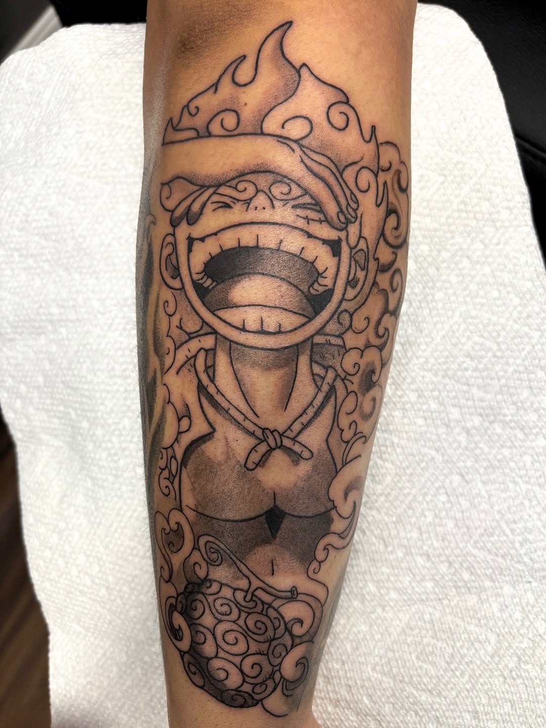 Tattoo by @profound.desires — anime, black_and_grey