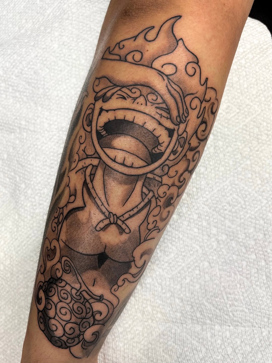 Tattoo by @profound.desires — anime, black_and_grey