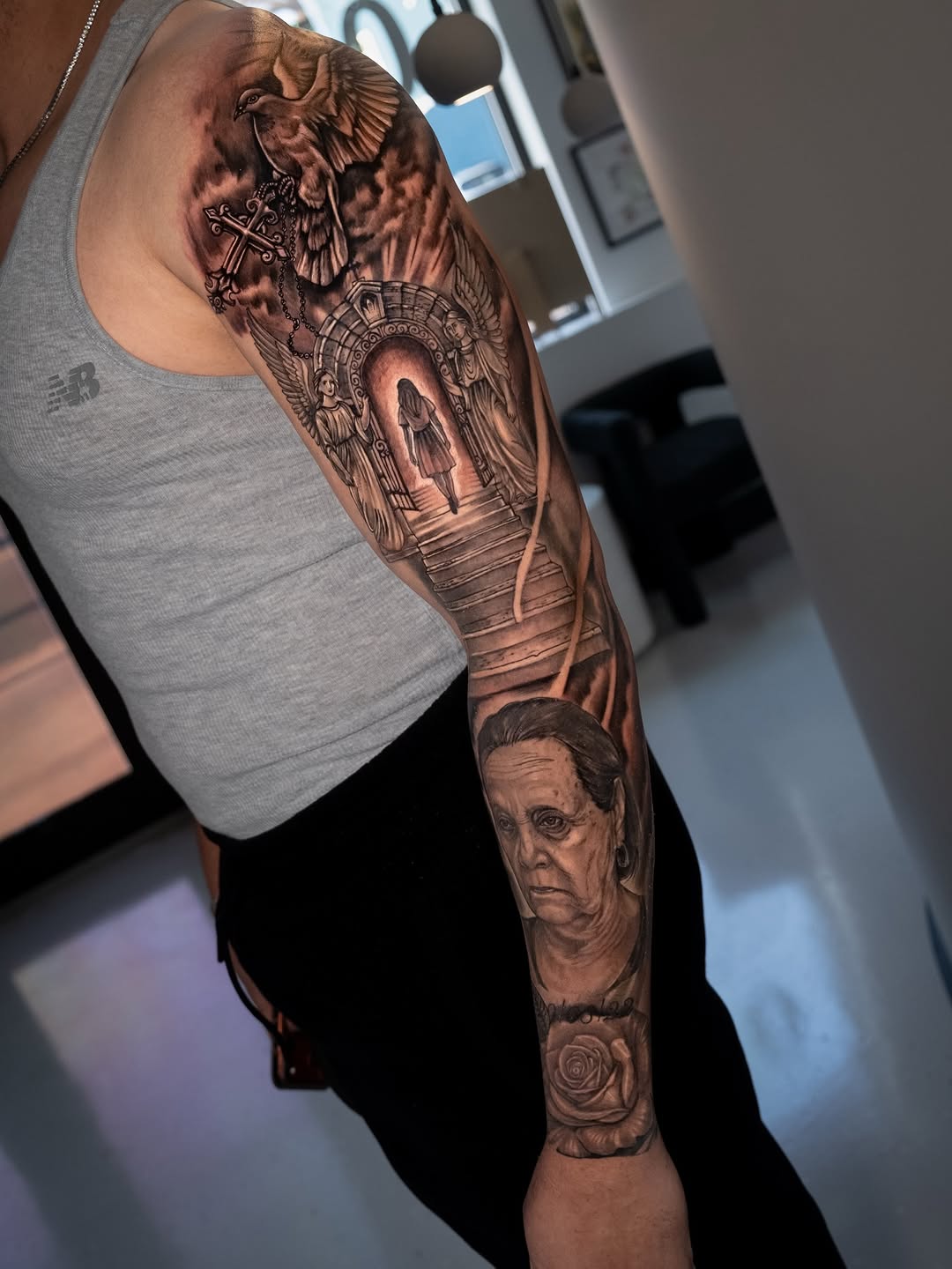 Tattoo by @eriktats13 — realism, black_and_grey