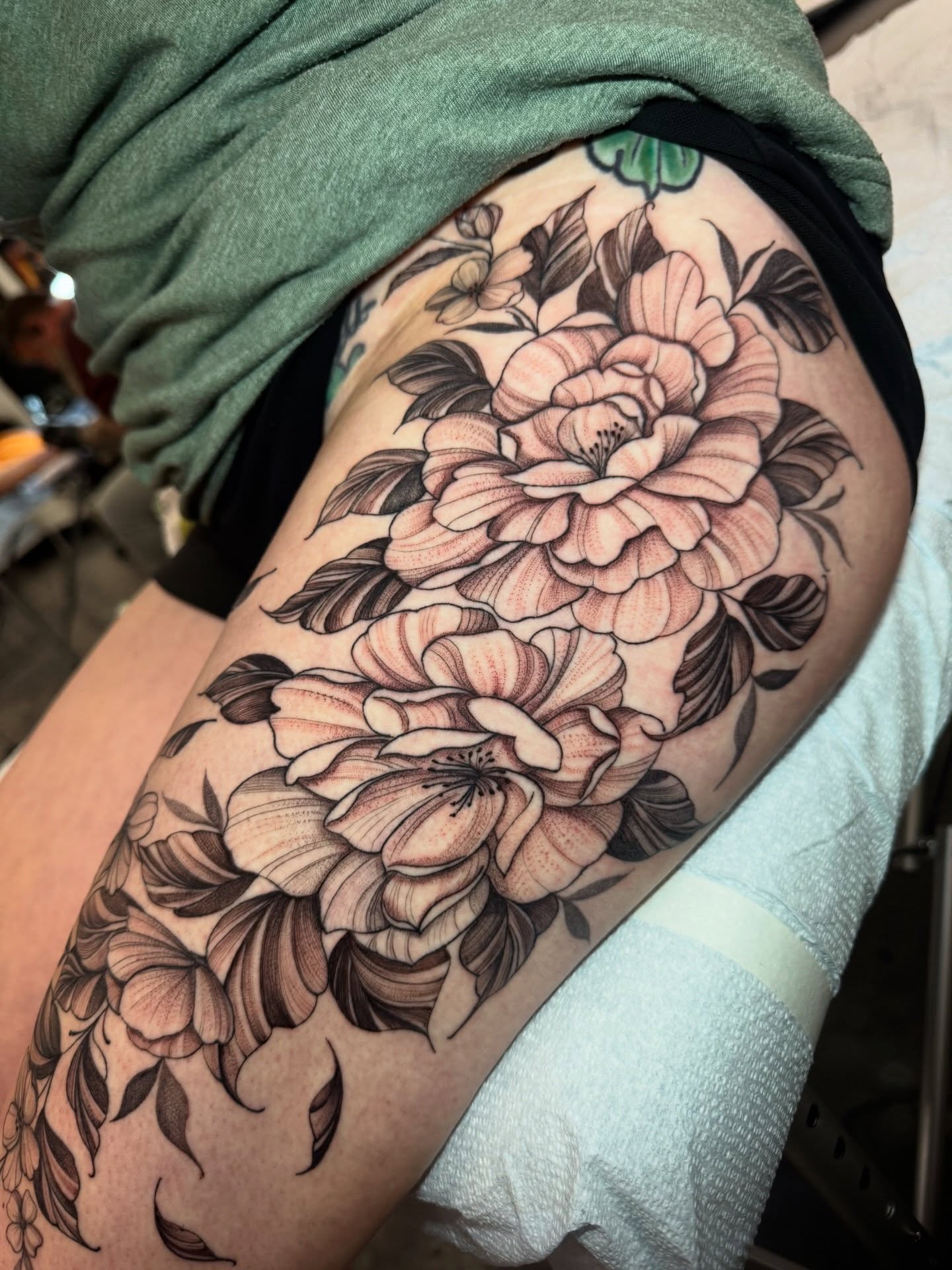 Floral bouquet realism tattoo on the thigh by Paola Pineda Tattoo, Knoxville, Tennessee