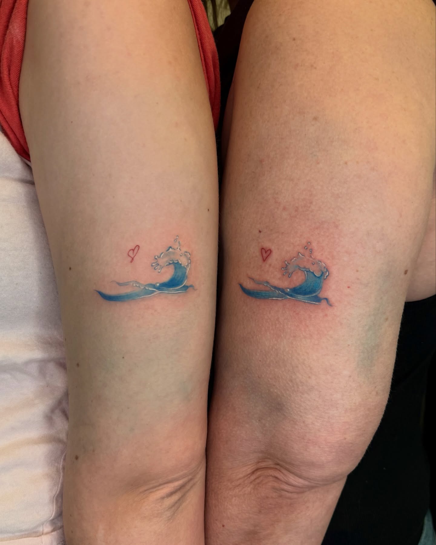 Wave with heart dotwork tattoo on the forearm by Dabbo🩸