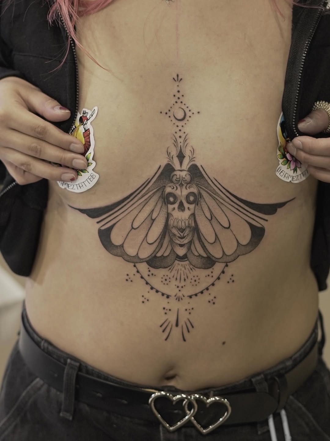 Moth skull with celestial elements fine line tattoo on the ribs by Pedro D Gamez