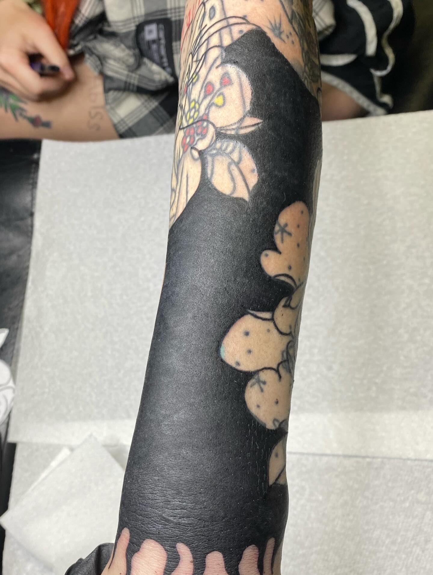 Octopus black and grey tattoo on the forearm by Nosferatu