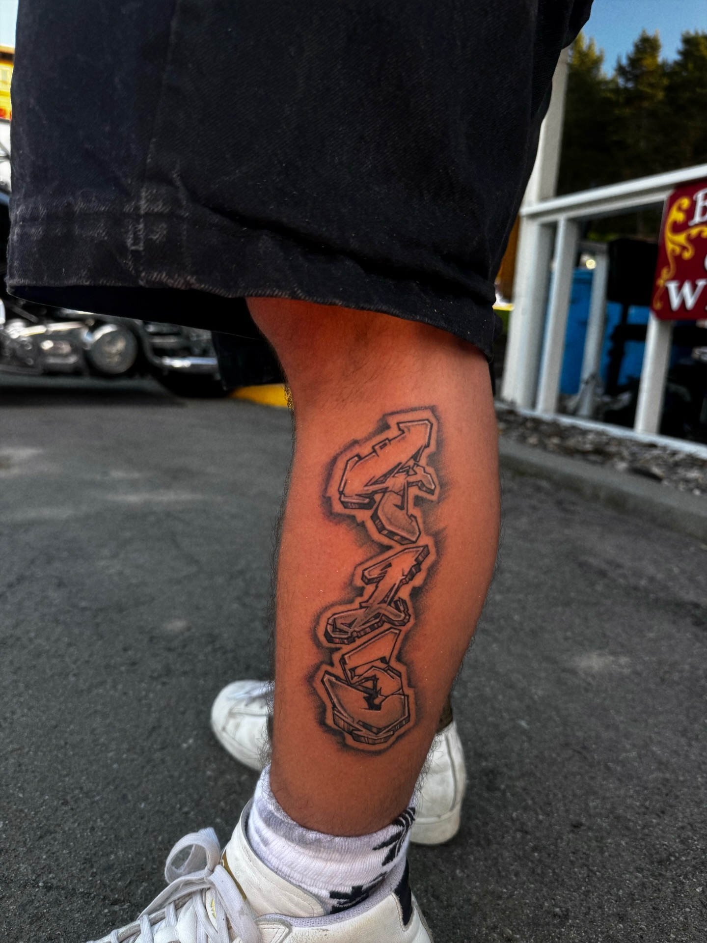 Graffiti-style lettering tattoo on the calf by 🕸️EC🥷🏼🌁🇲🇽🕸️