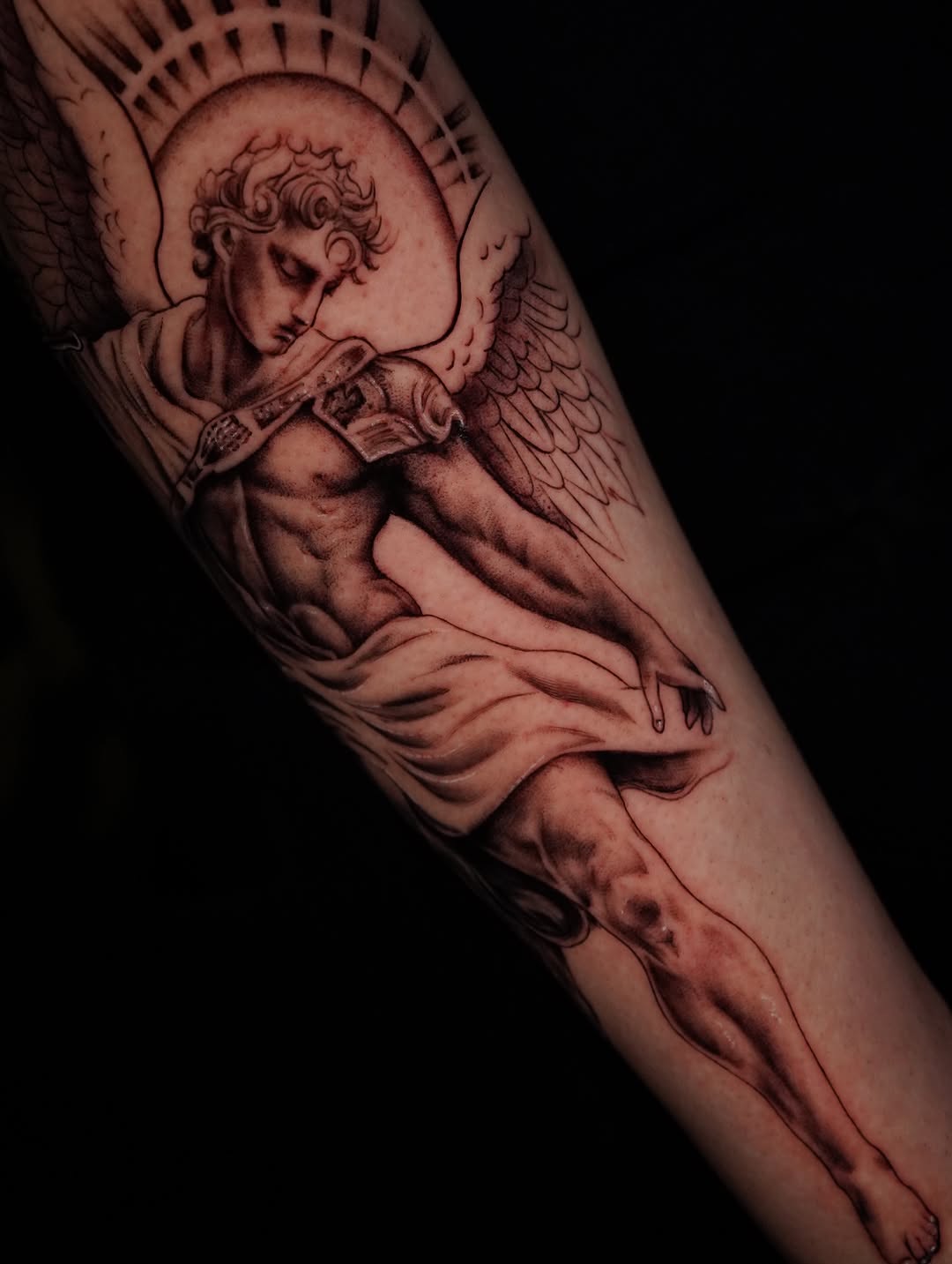 Angelic figure realism tattoo on the forearm by Jennifer Garcia