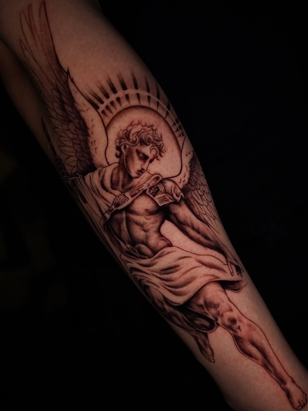 Angel with sword realism tattoo on the forearm by Jennifer Garcia