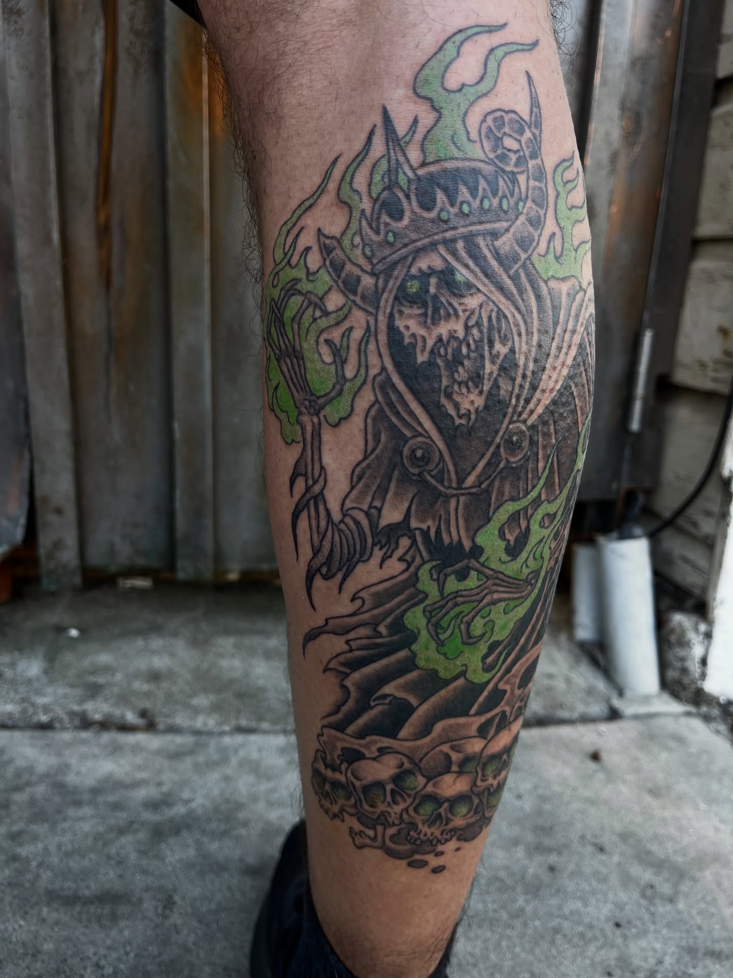 Horse and skulls American traditional tattoo on the calf by Campbell Zane Alexander