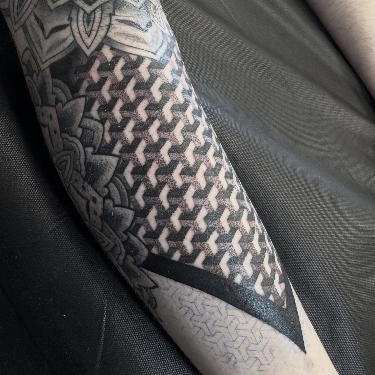 Geometric pattern geometric tattoo on the forearm by Landon Lewis