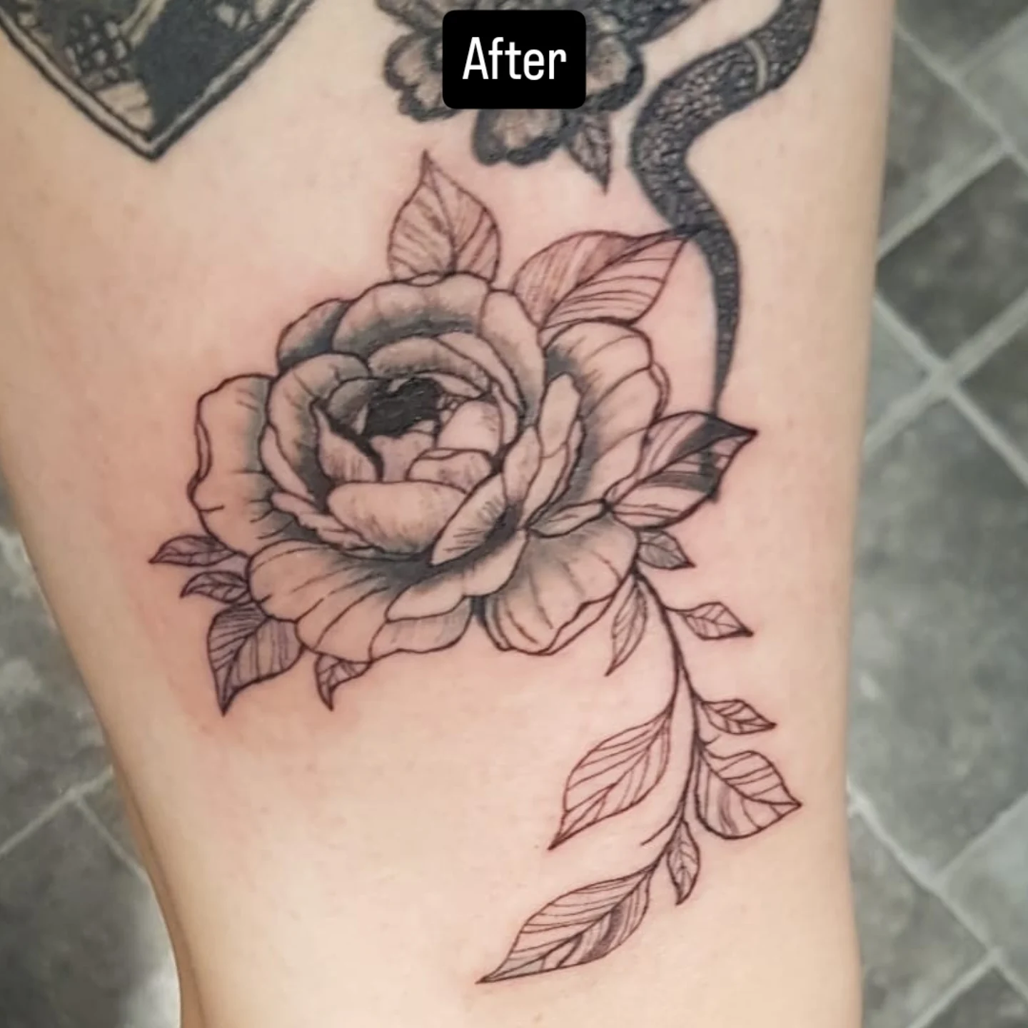 Rose black and grey tattoo on the forearm by Artful Ink