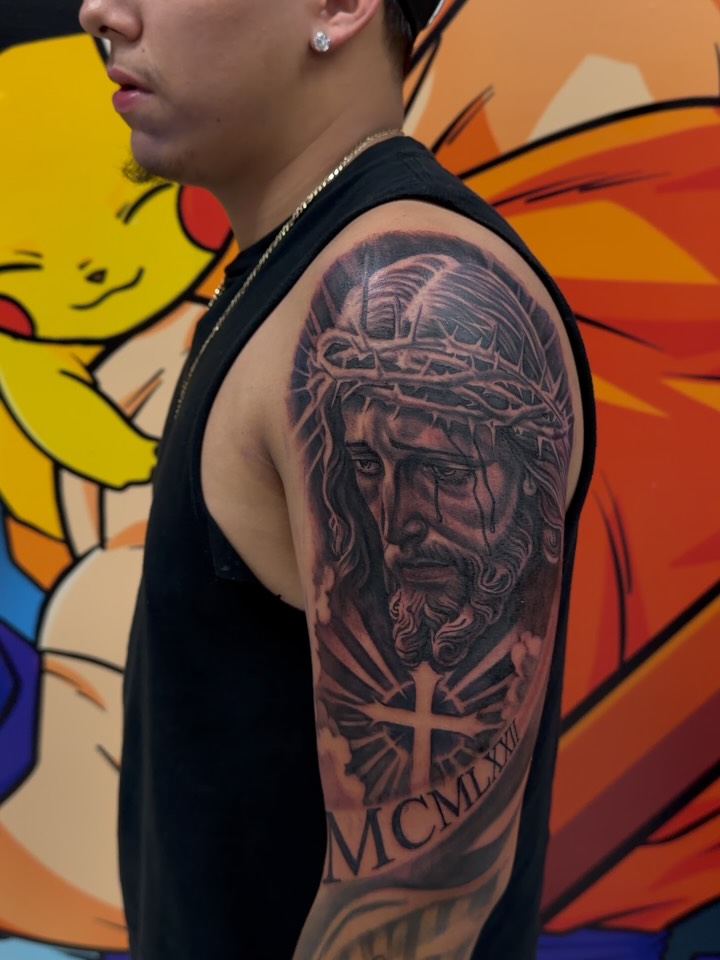 Jesus Christ realism tattoo on the shoulder by Michigan📍 Day Sessions $850, Wayne, Michigan