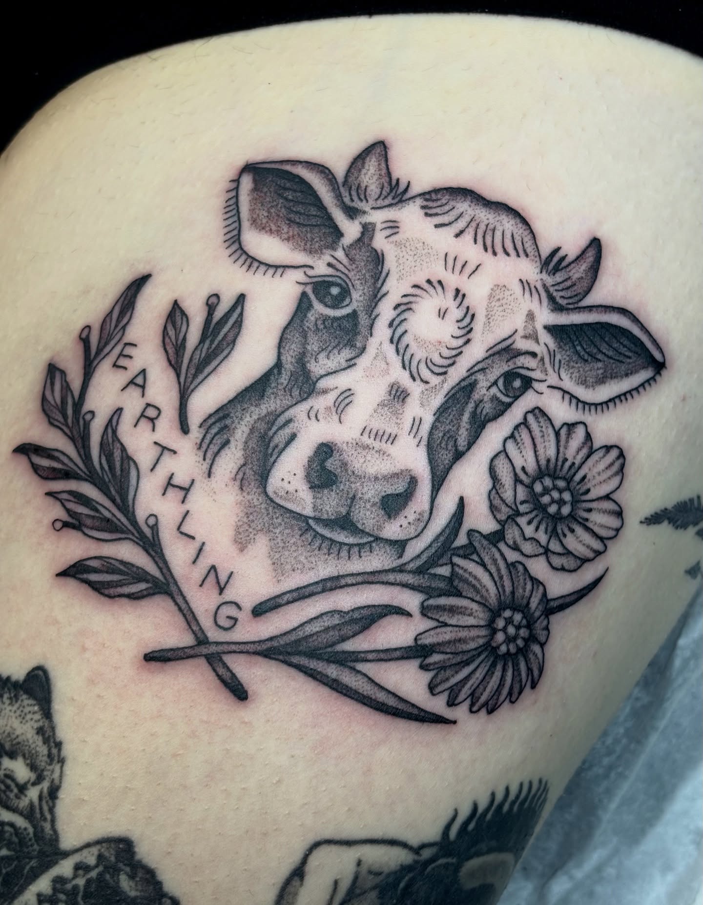 Cow and floral wreath realism tattoo on the shoulder by ✨madison✨, Portland, Oregon
