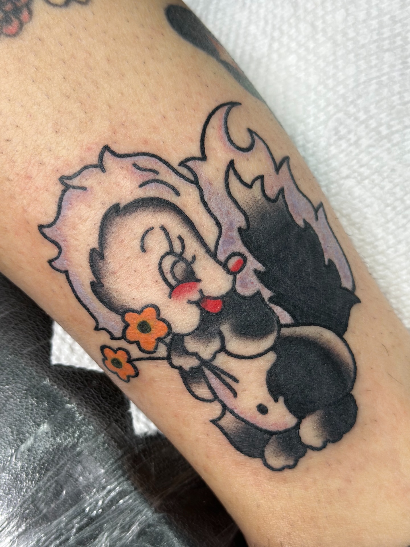Betty Boop American traditional tattoo on the forearm by Lucy Jay