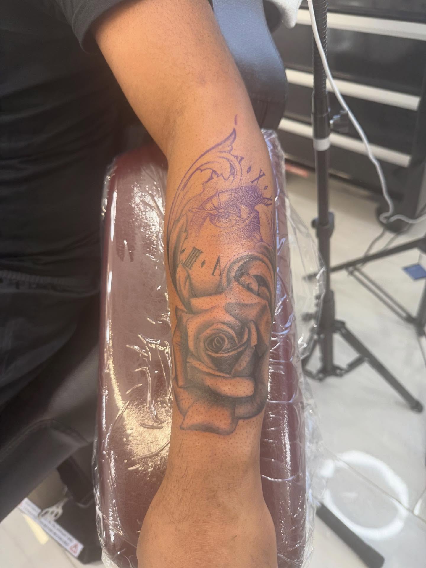 Rose and clock black and grey tattoo on the forearm by ♍️𝒾𝒸𝒽𝑒𝓁𝓁𝑒⁺‧₊˚ ཐི⋆♱⋆ཋྀ ˚₊‧⁺, Charlotte, North Carolina