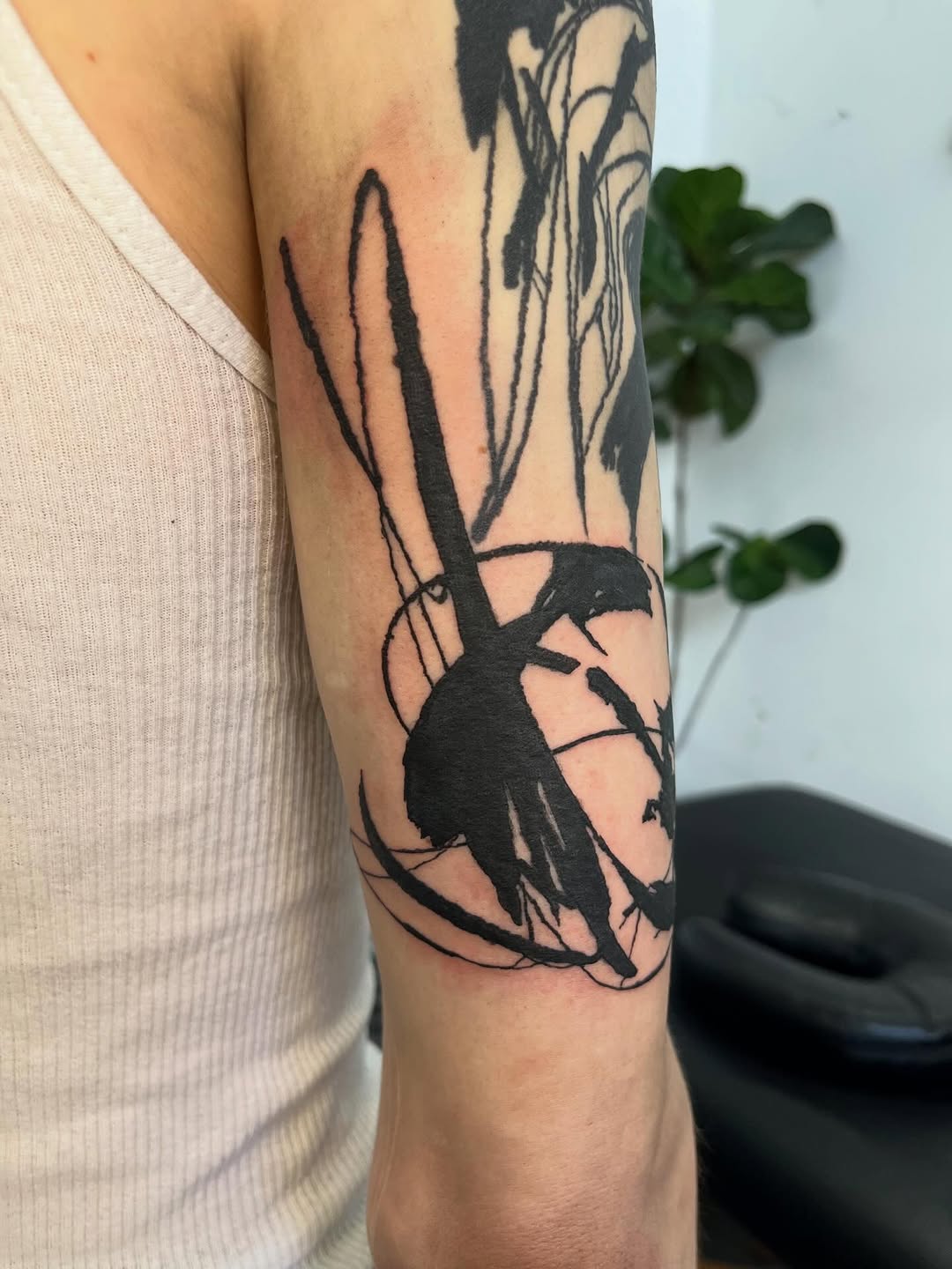 Abstract black ink blackwork tattoo on the forearm by @godsfirmgrip