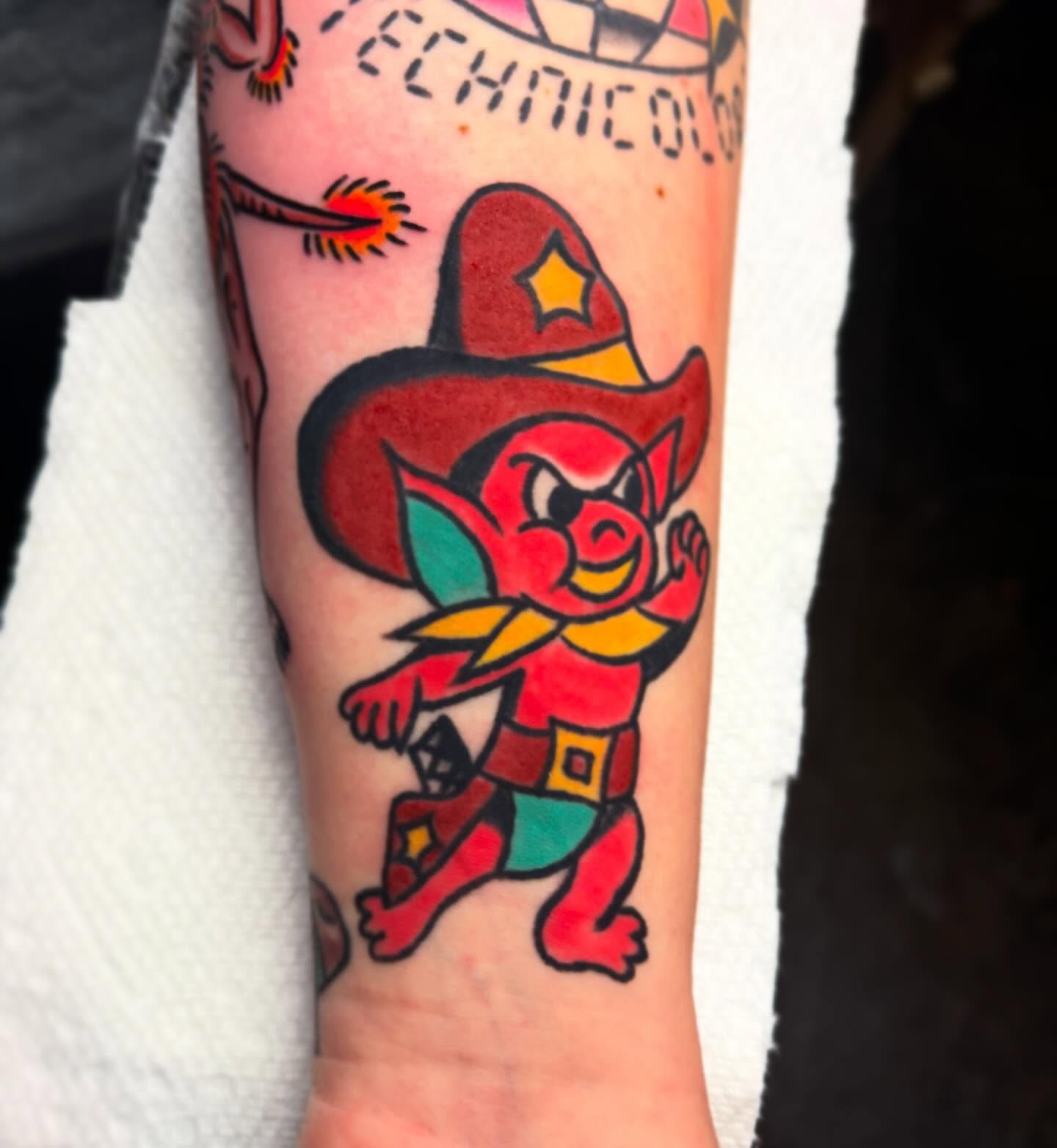 Cowboy character American traditional tattoo on the forearm by Jacob, Marion, Illinois