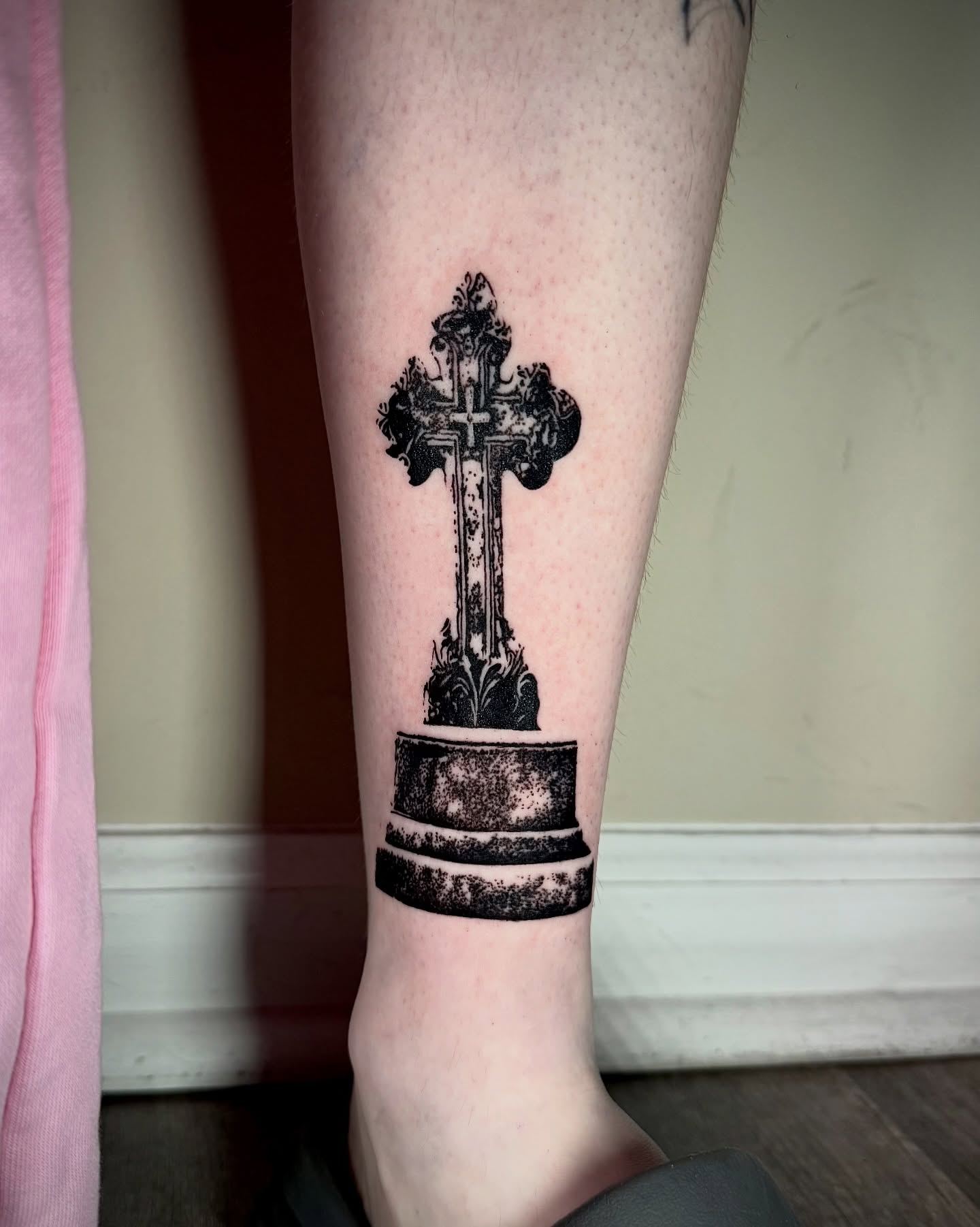 Cross dotwork tattoo on the calf by Emily‹𝟹