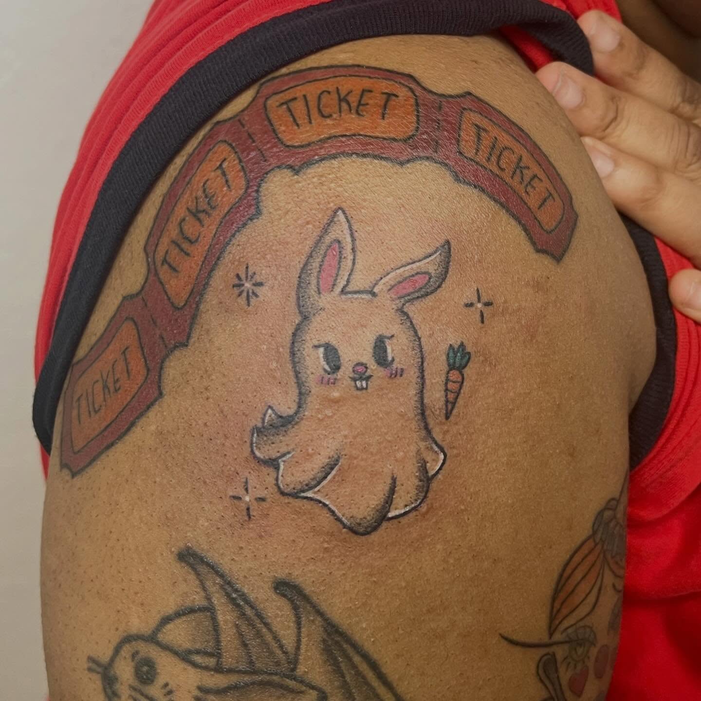Rabbit ghost illustrative tattoo on the shoulder by Amber Rose