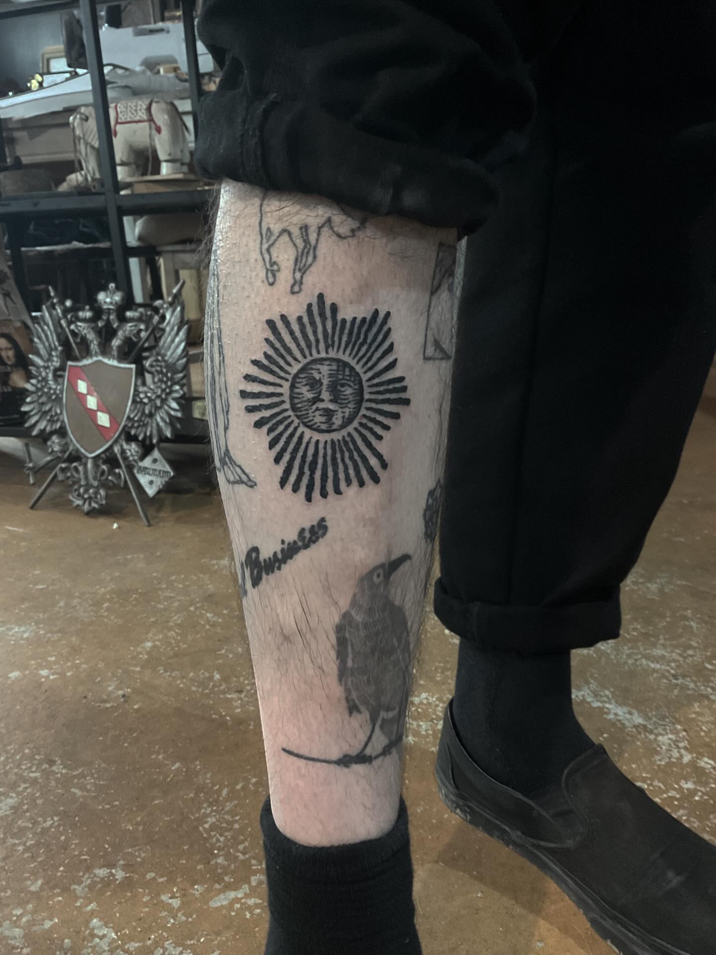 Sun and bird black and grey tattoo on the leg by ๐ญ๐๐๐๐