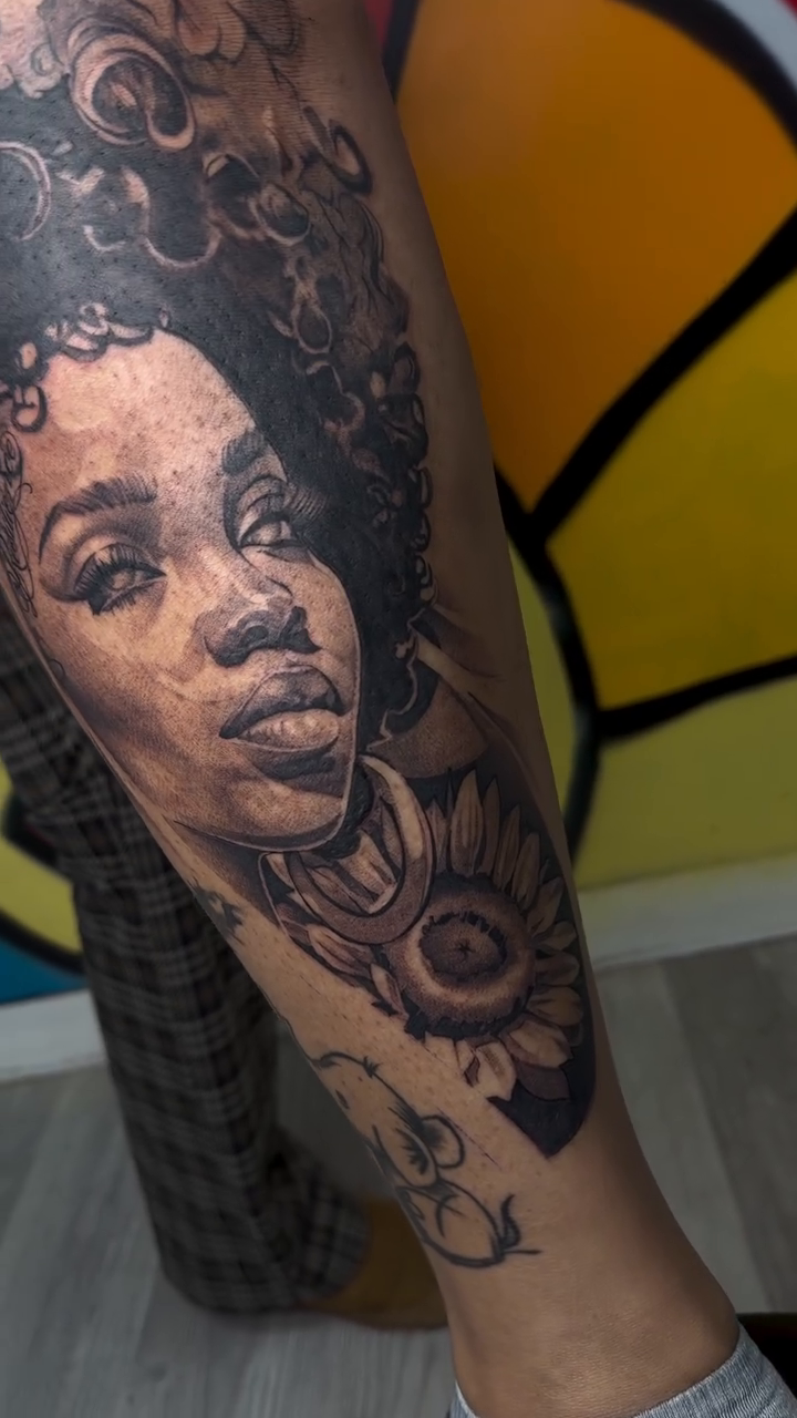 Realism tattoo on the leg by Antonio