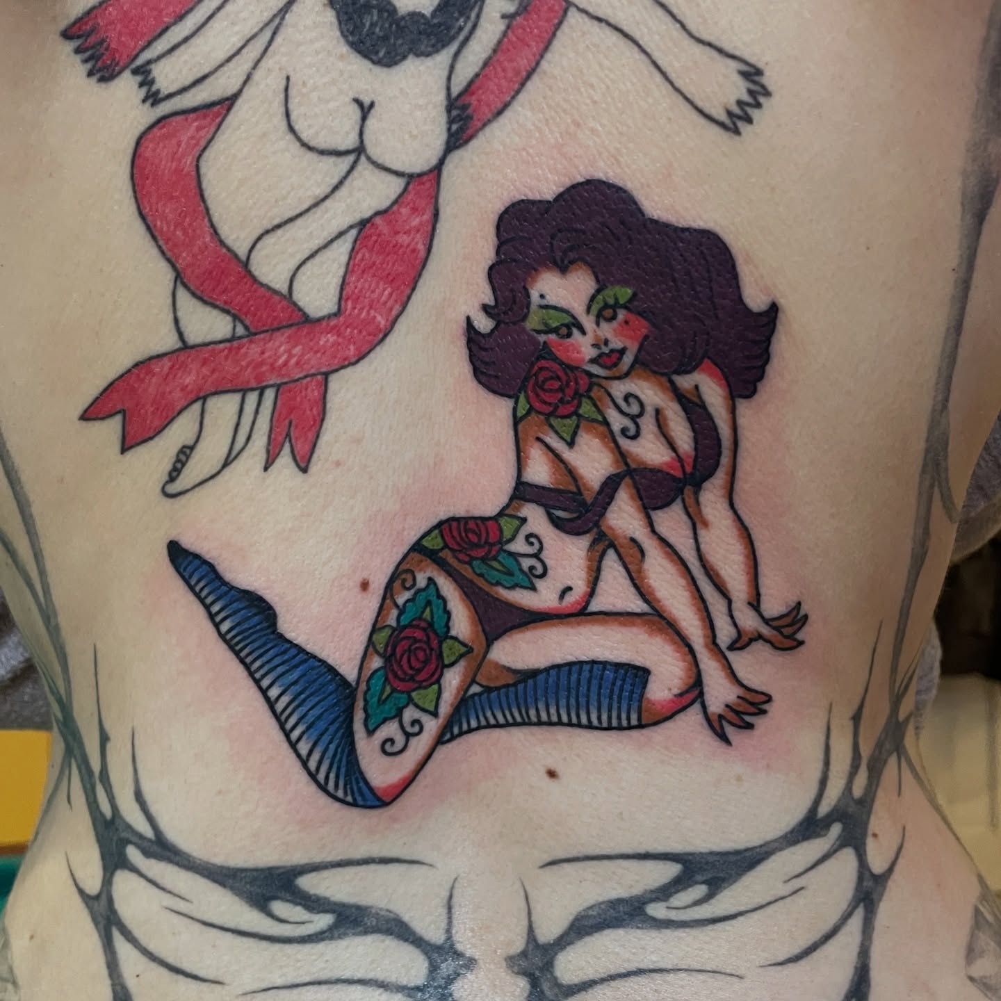 Mermaid American traditional tattoo on the back by zoe ๐