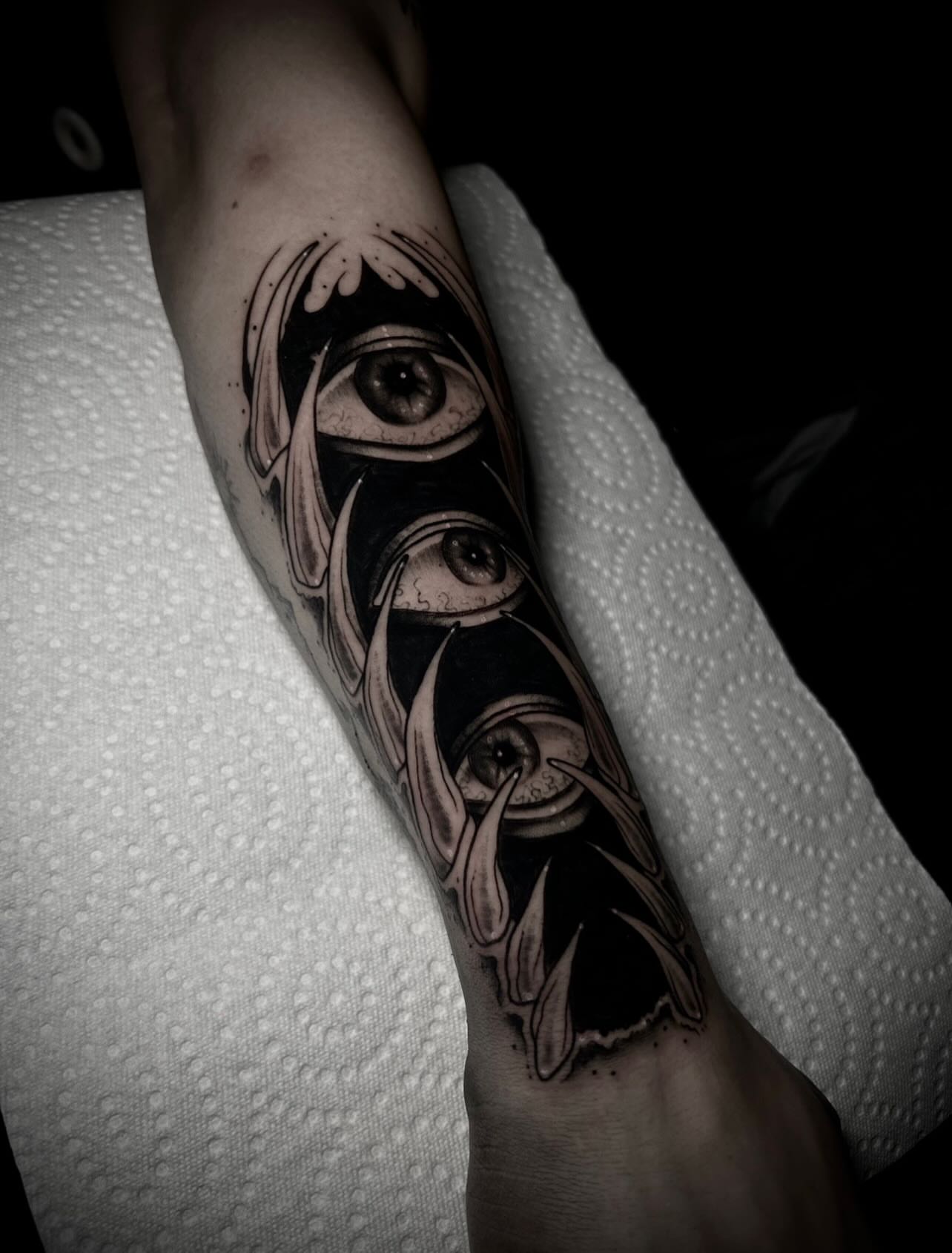 Eyes geometric tattoo on the forearm by Heaven Arianna