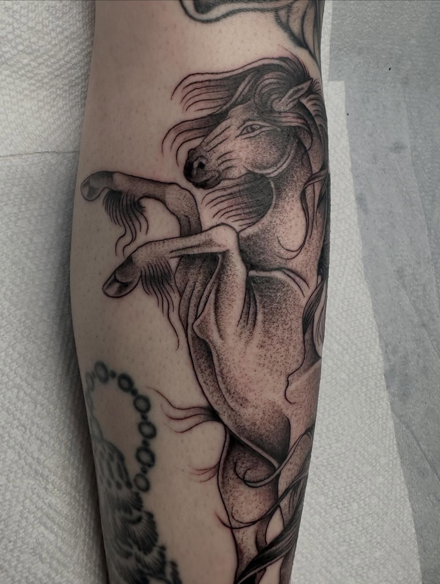 Horse and woman realism tattoo on the forearm by Lia Massari