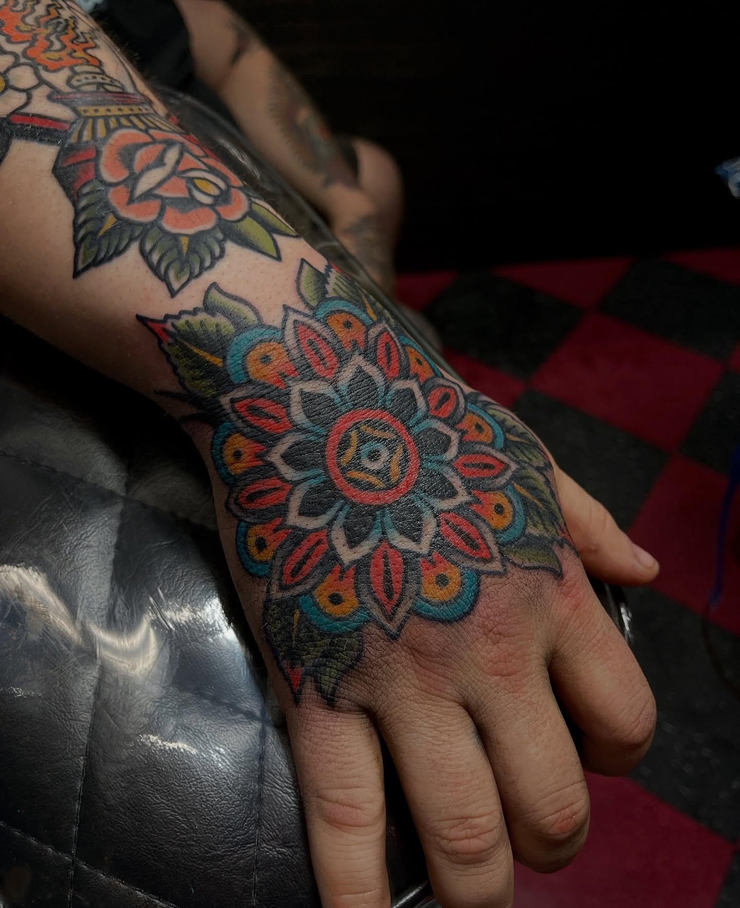 Mandala American traditional tattoo on the hand by Patrick Miller, Huber Heights, Ohio