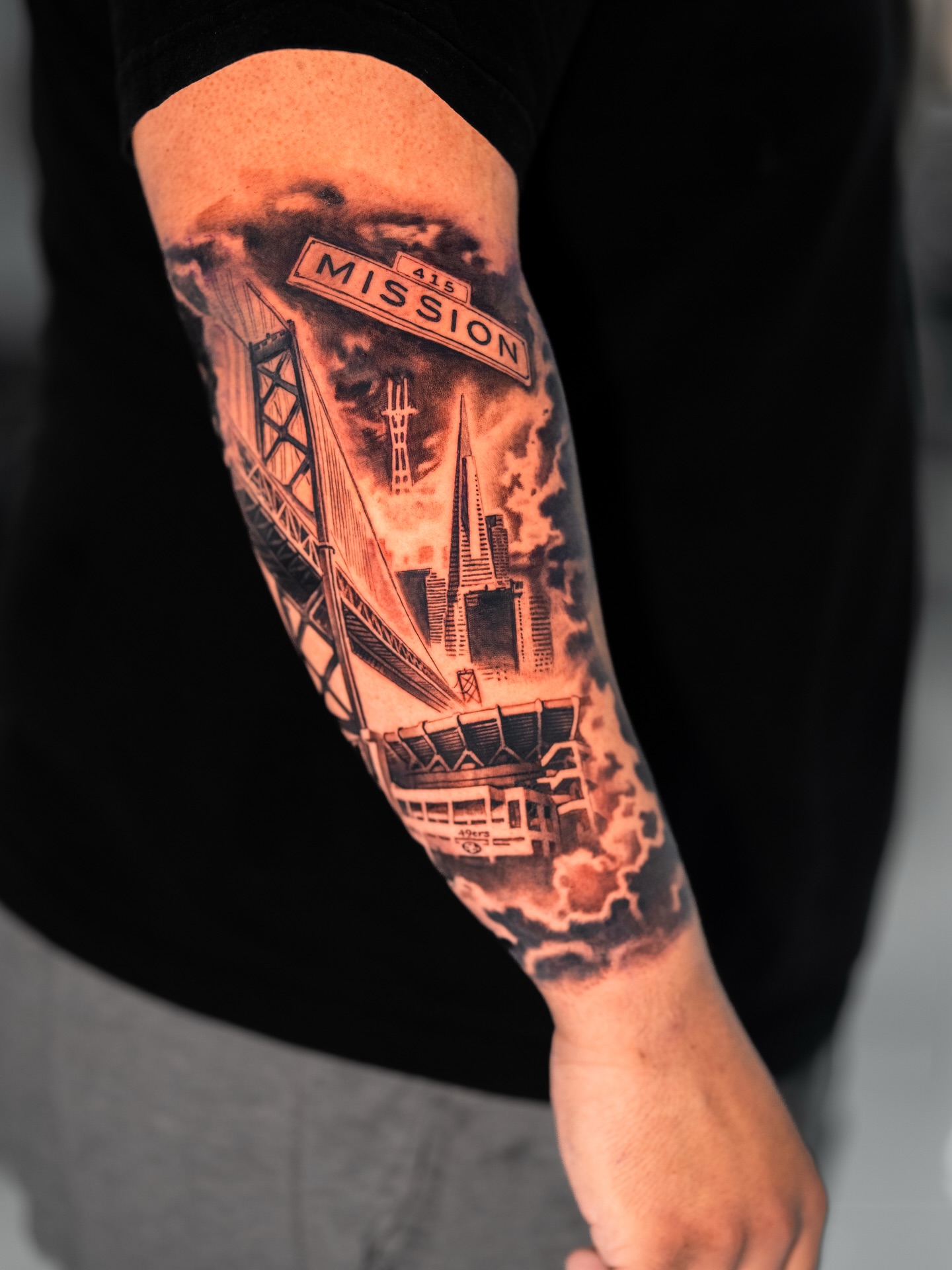 San Francisco landmarks realism tattoo on the forearm by Joey Hella Tattoo Artist