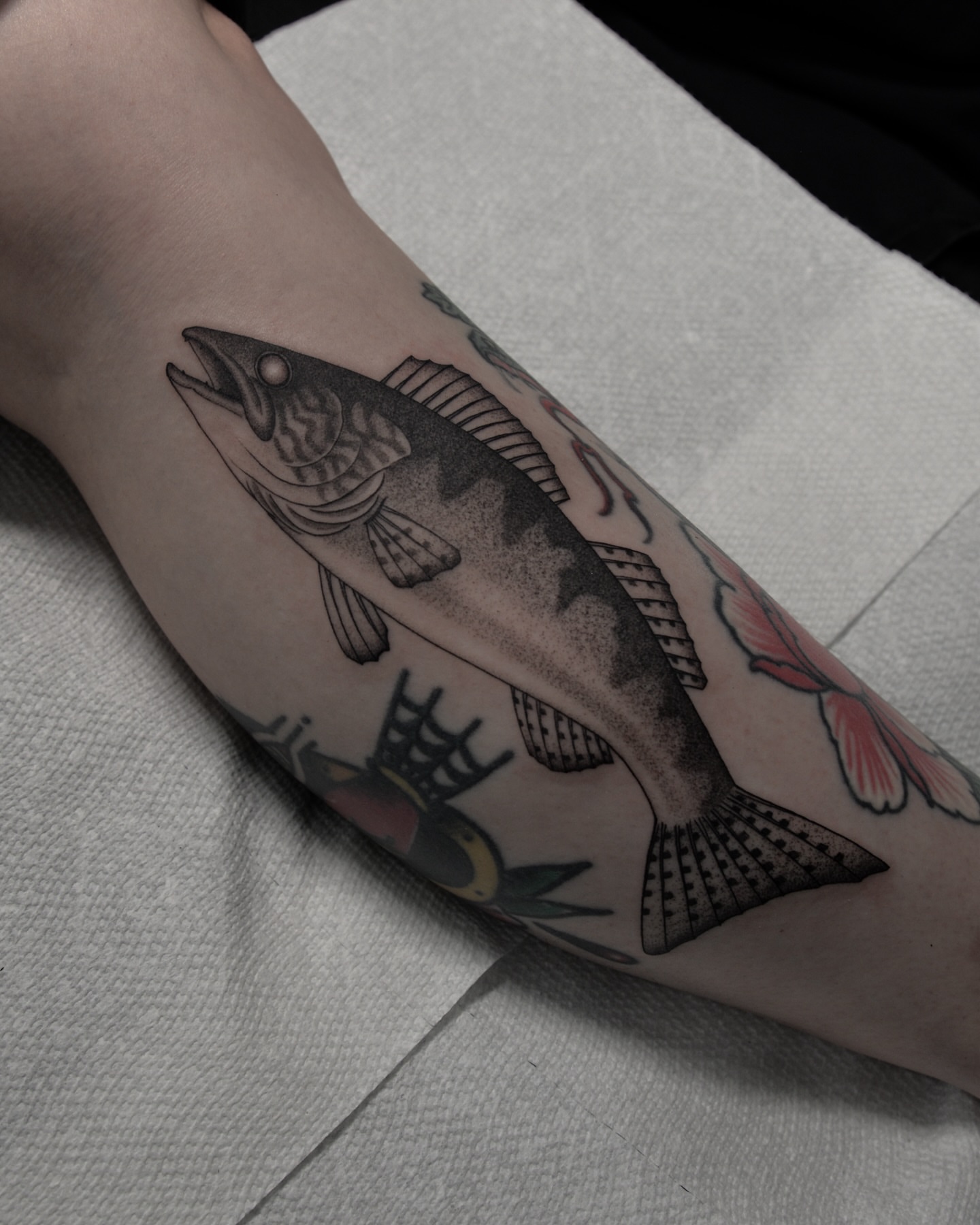 Fish black and grey tattoo on the forearm by zak brochu, Windsor, Ontario