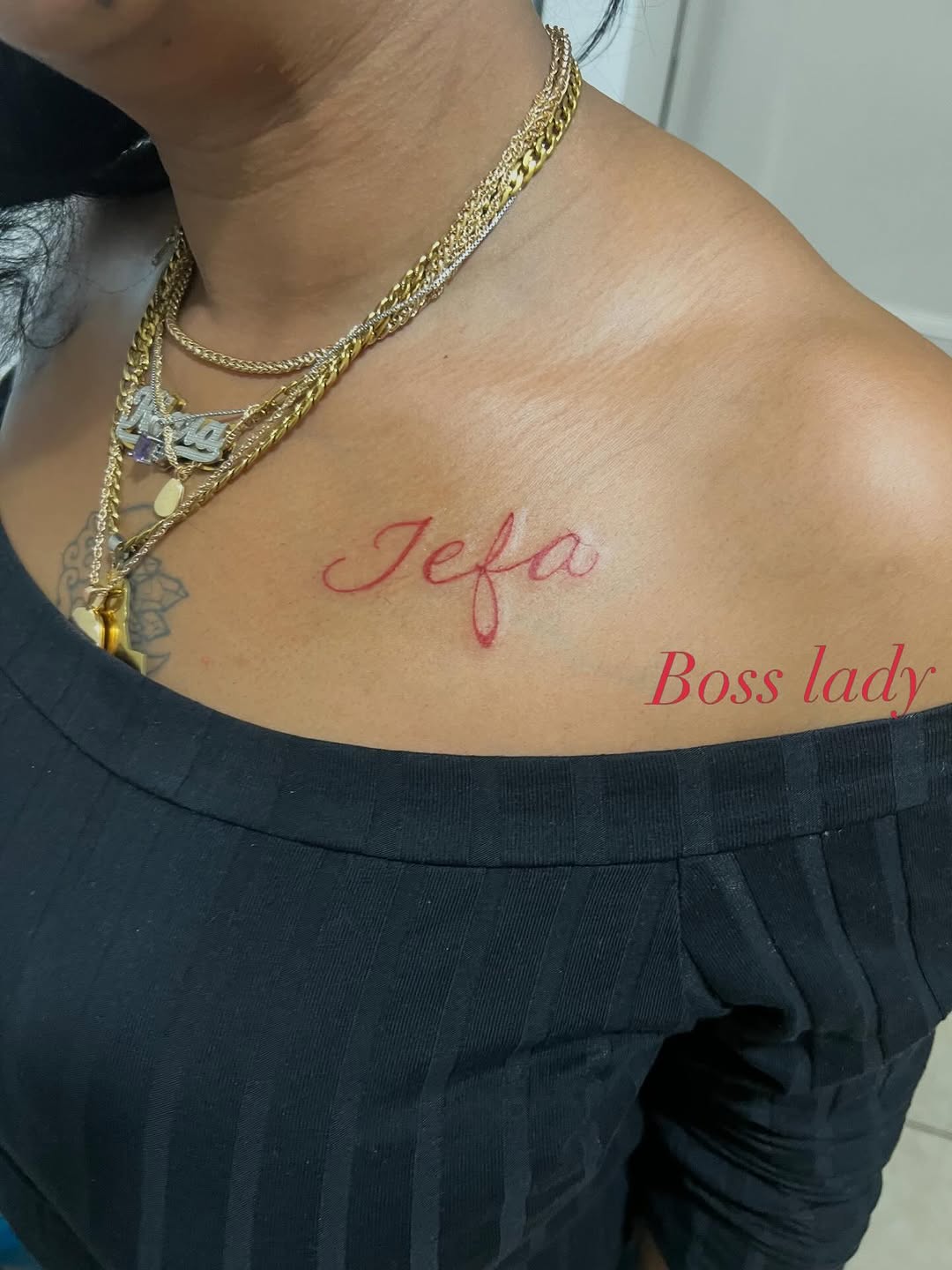 Jefa and Boss lady text tattoo on the shoulder by Deangelo Inkcrazy Dukes