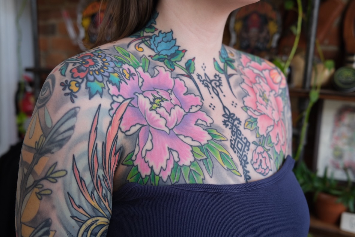 Peony American traditional tattoo on the back by Zak Colburn