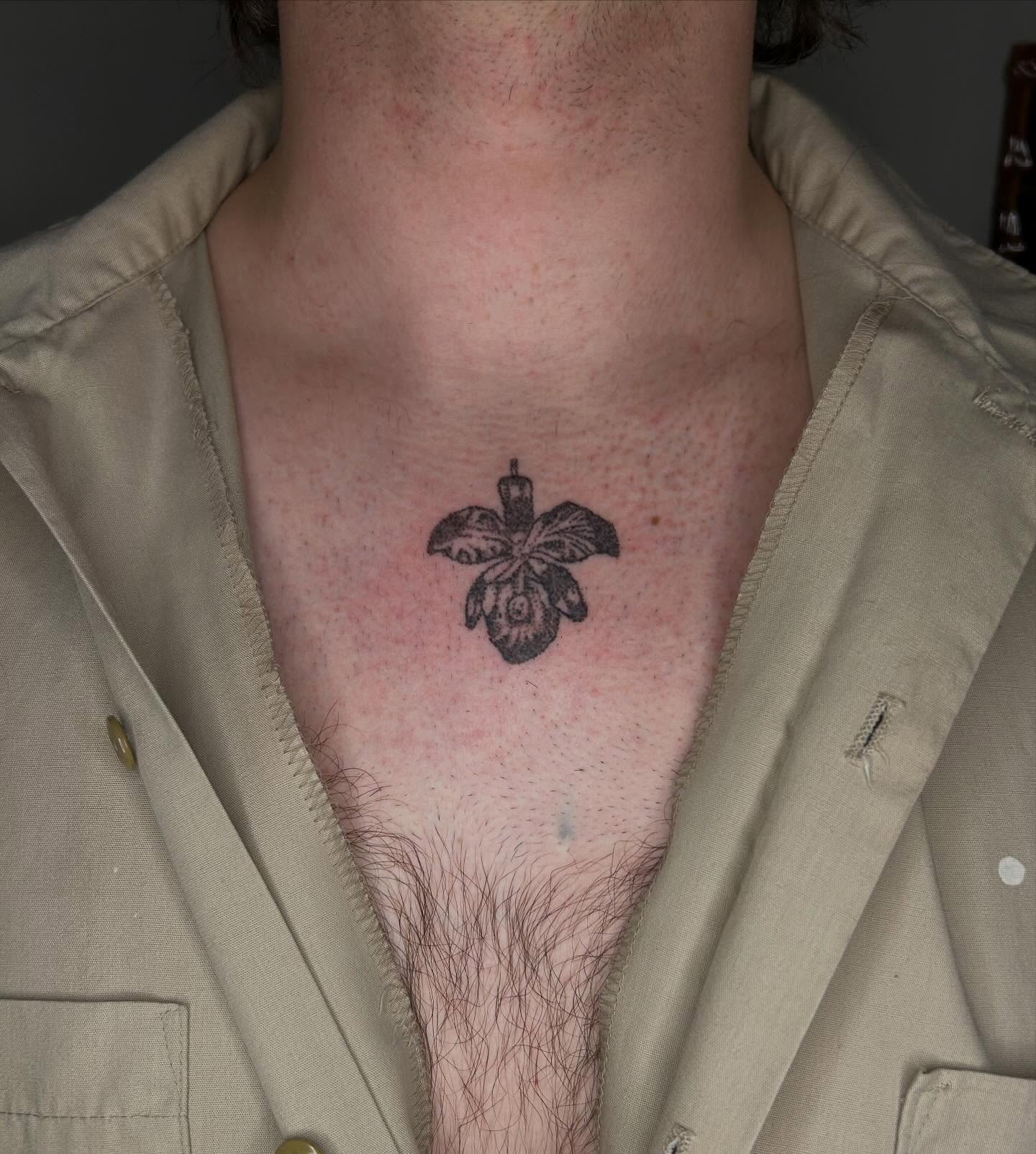 Orchid black and grey tattoo on the chest by ˙⋆✮⋆˙‧₊˚✧ sophie ✧˚₊‧˙⋆✮⋆˙