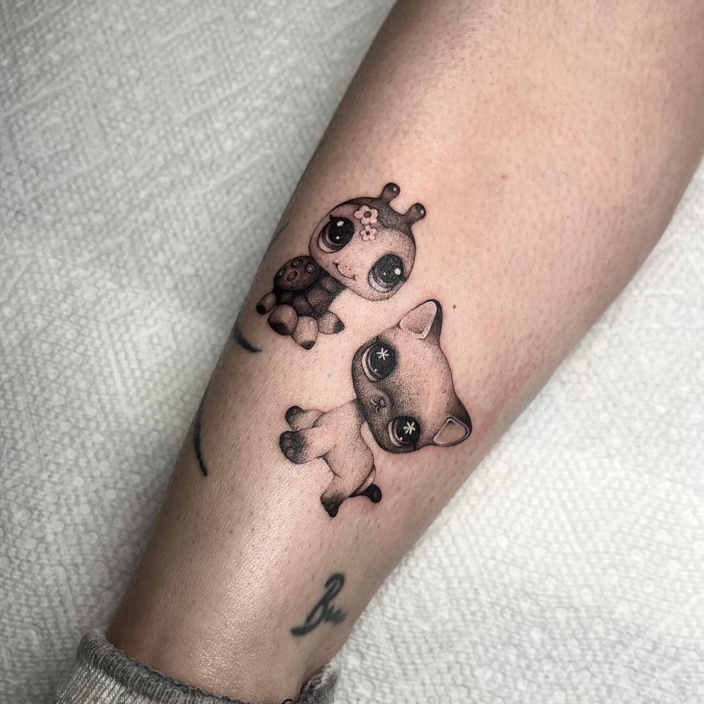Kawaii animals dotwork tattoo on the forearm by aurora