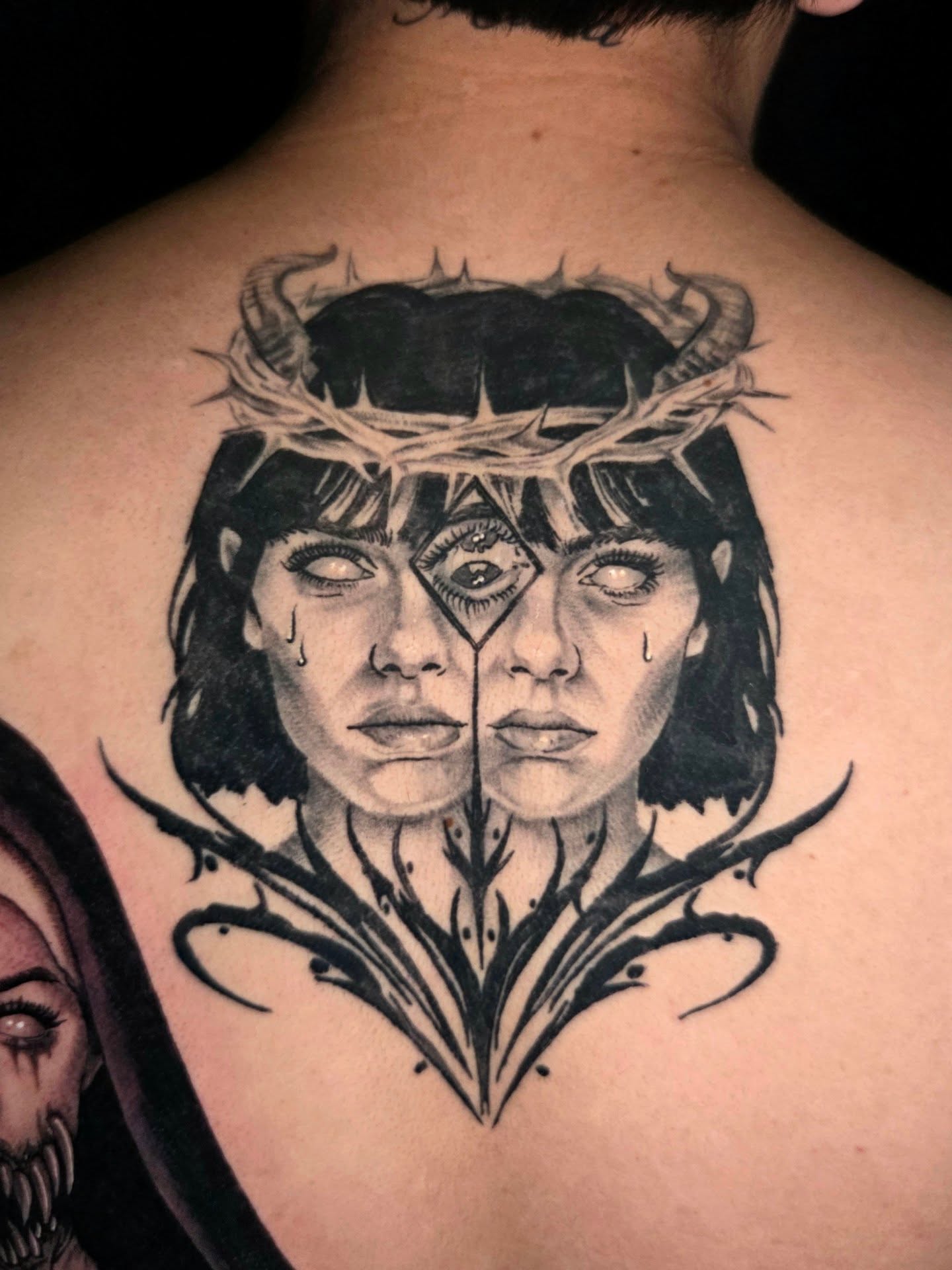 Woman's face realism tattoo on the back by Maya Neideck