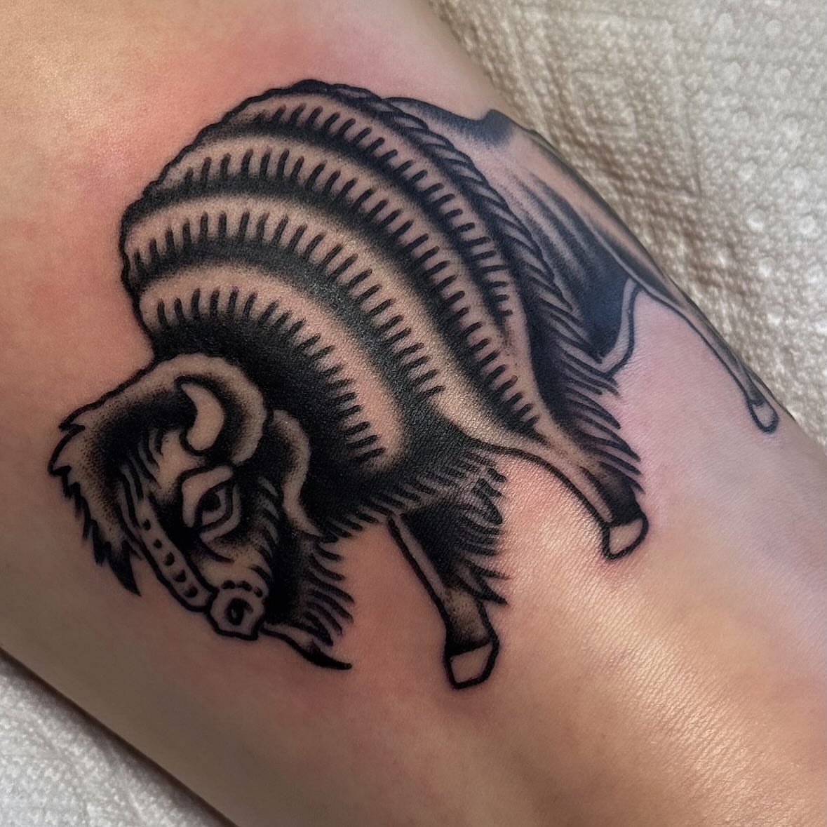 Fish black and grey tattoo on the forearm by Larry Love