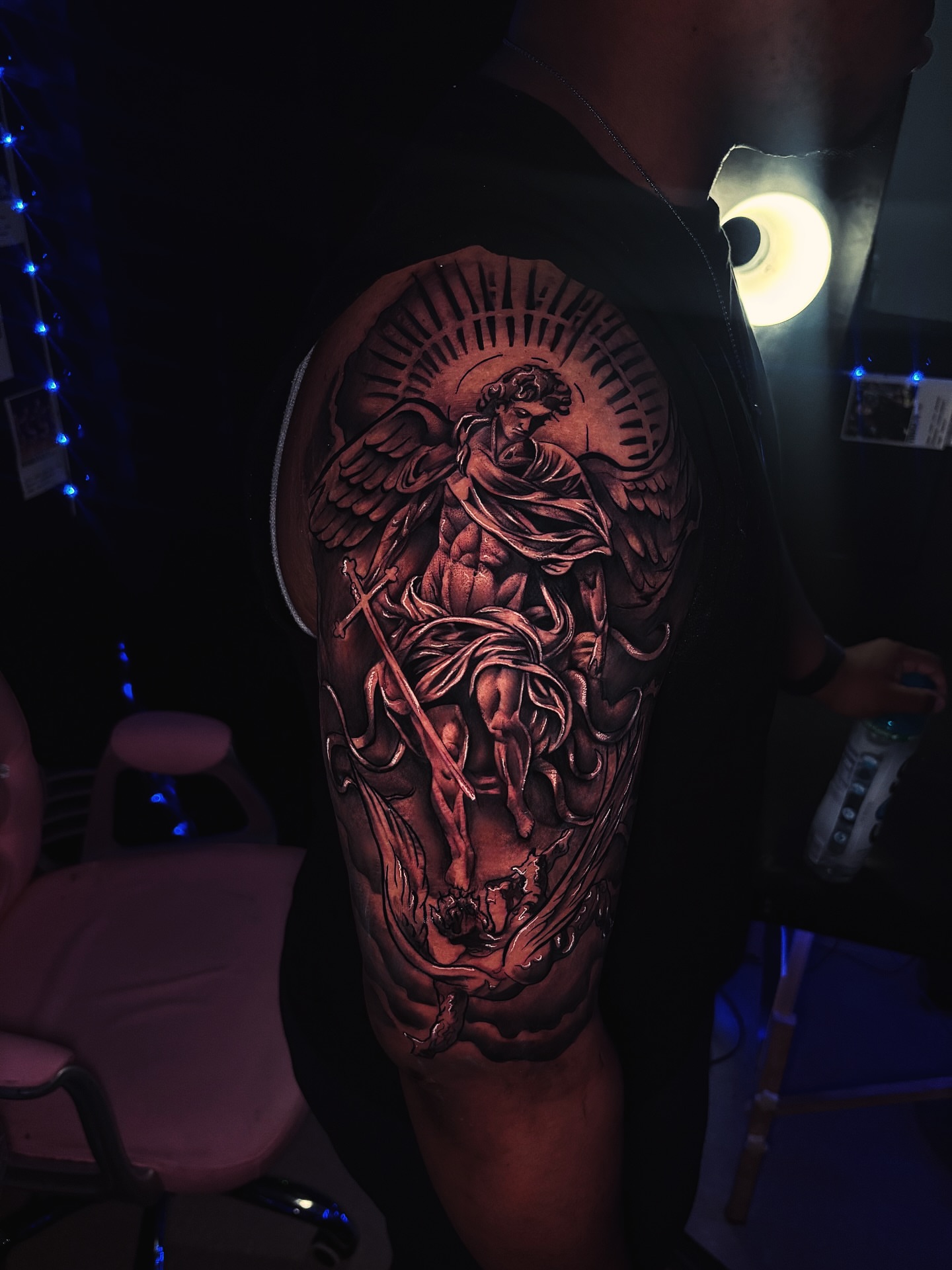 Angelic figure realism tattoo on the upper arm by Bri Tatted That