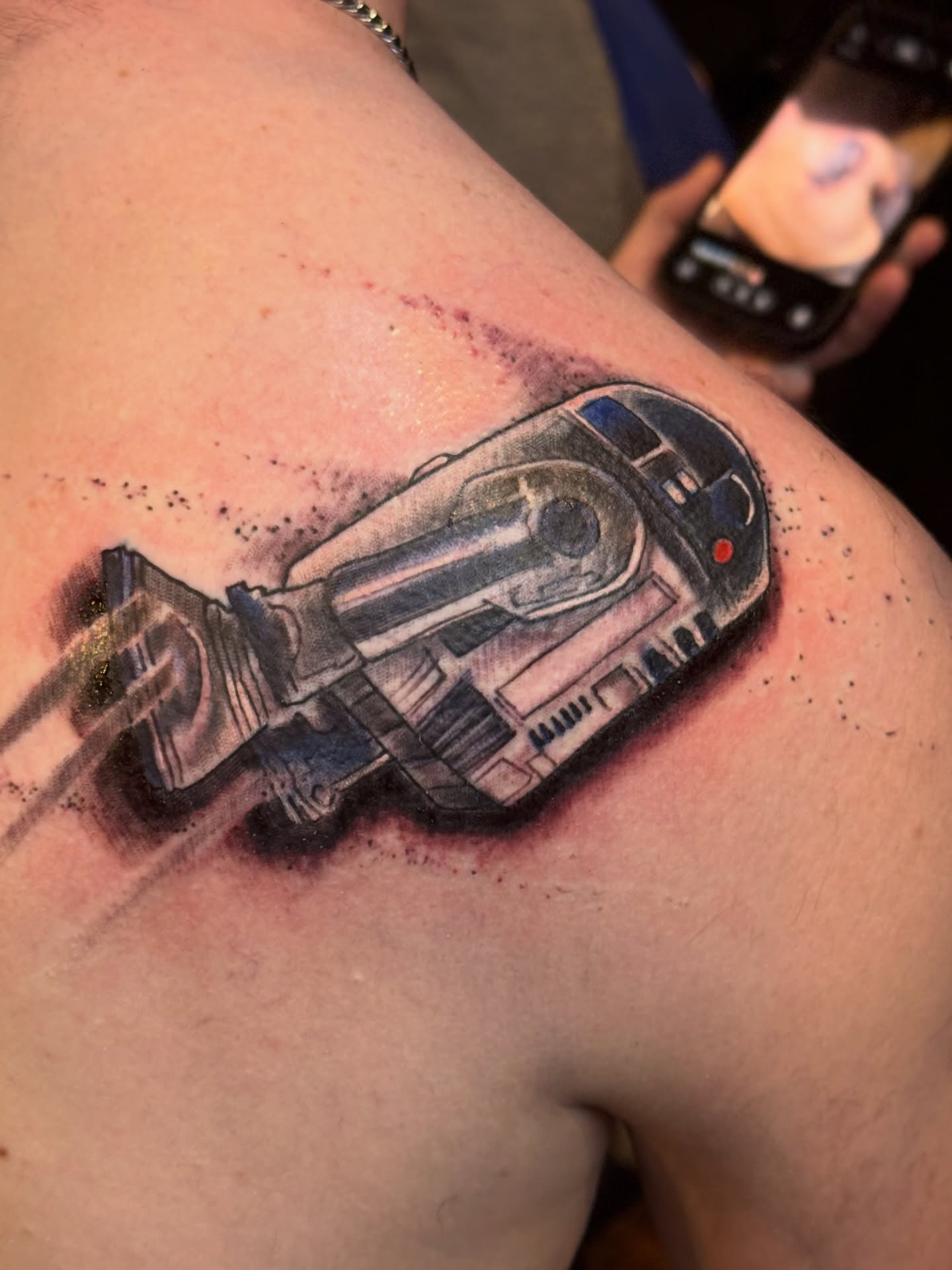 Spacecraft realism tattoo on the shoulder by Dave Robinowitz