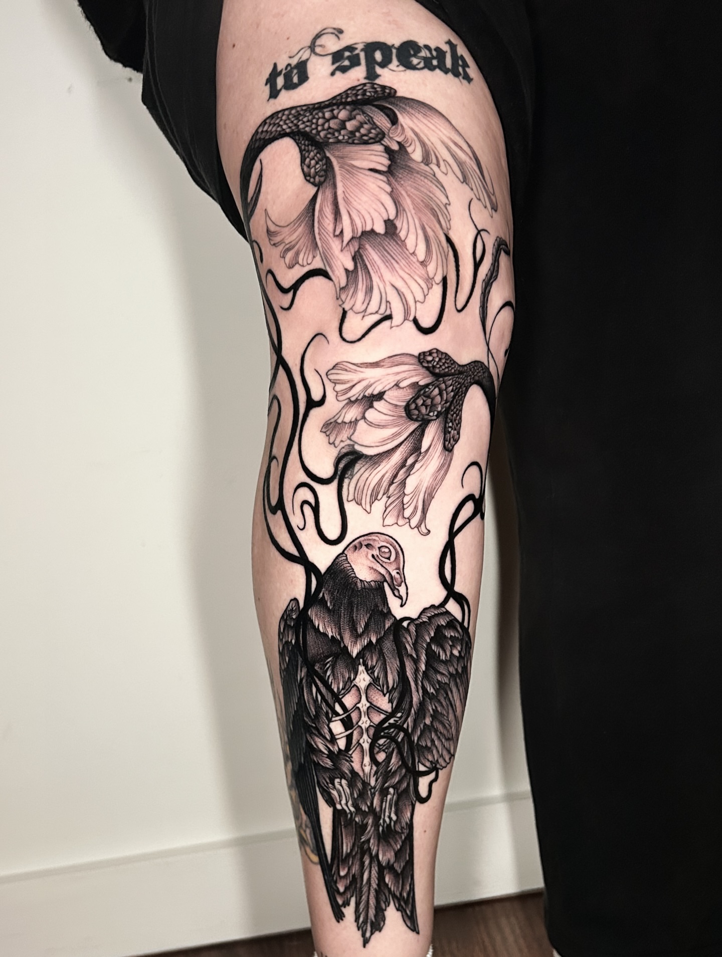 Vulture and serpents realism tattoo on the calf by Crystal Thorns