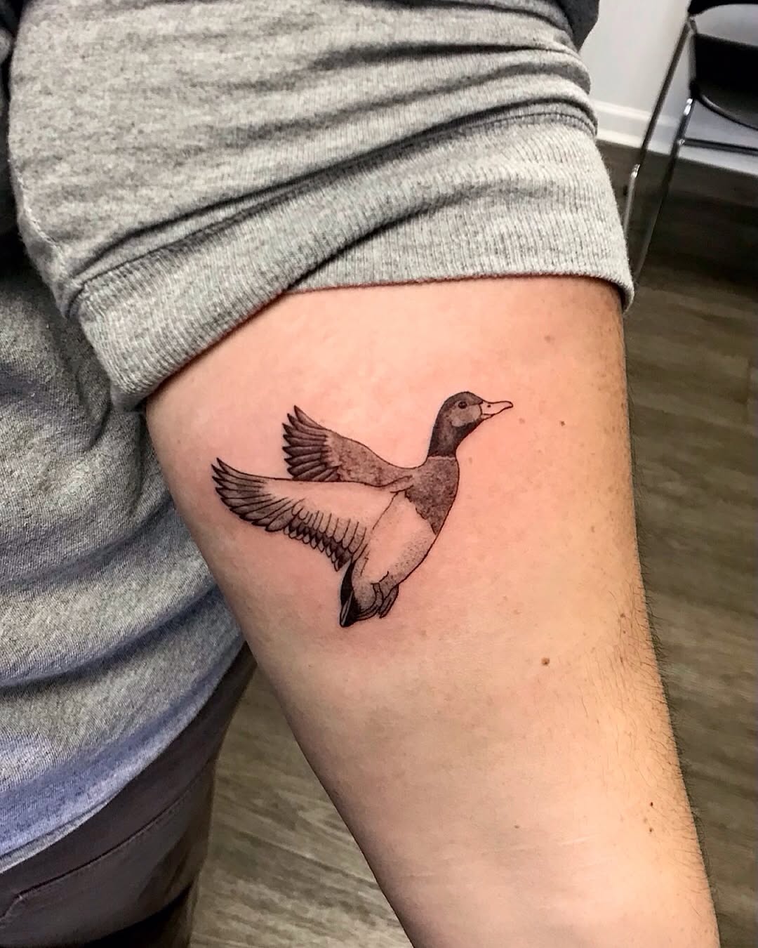 Duck fine line tattoo on the thigh by Cortnie, Nashville, Tennessee