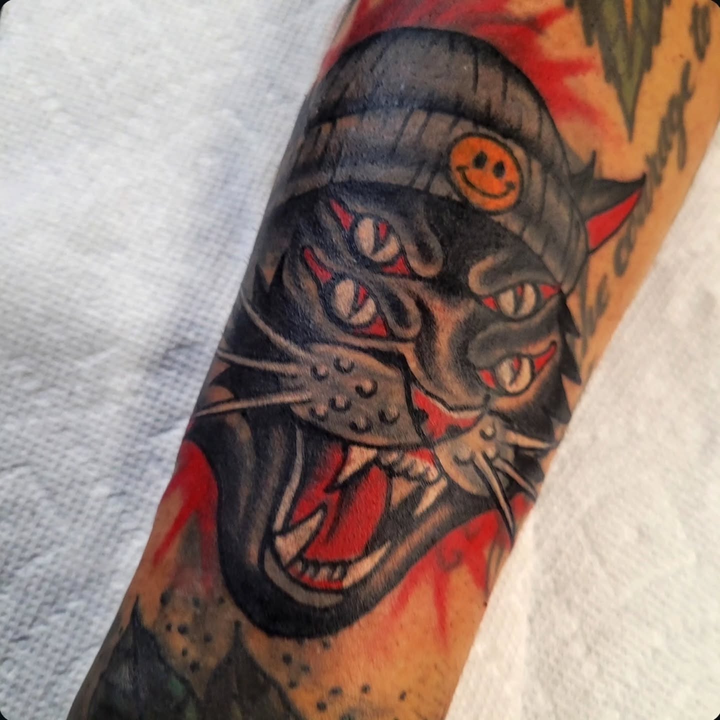 Panther warrior American traditional tattoo on the forearm by S. Madrid
