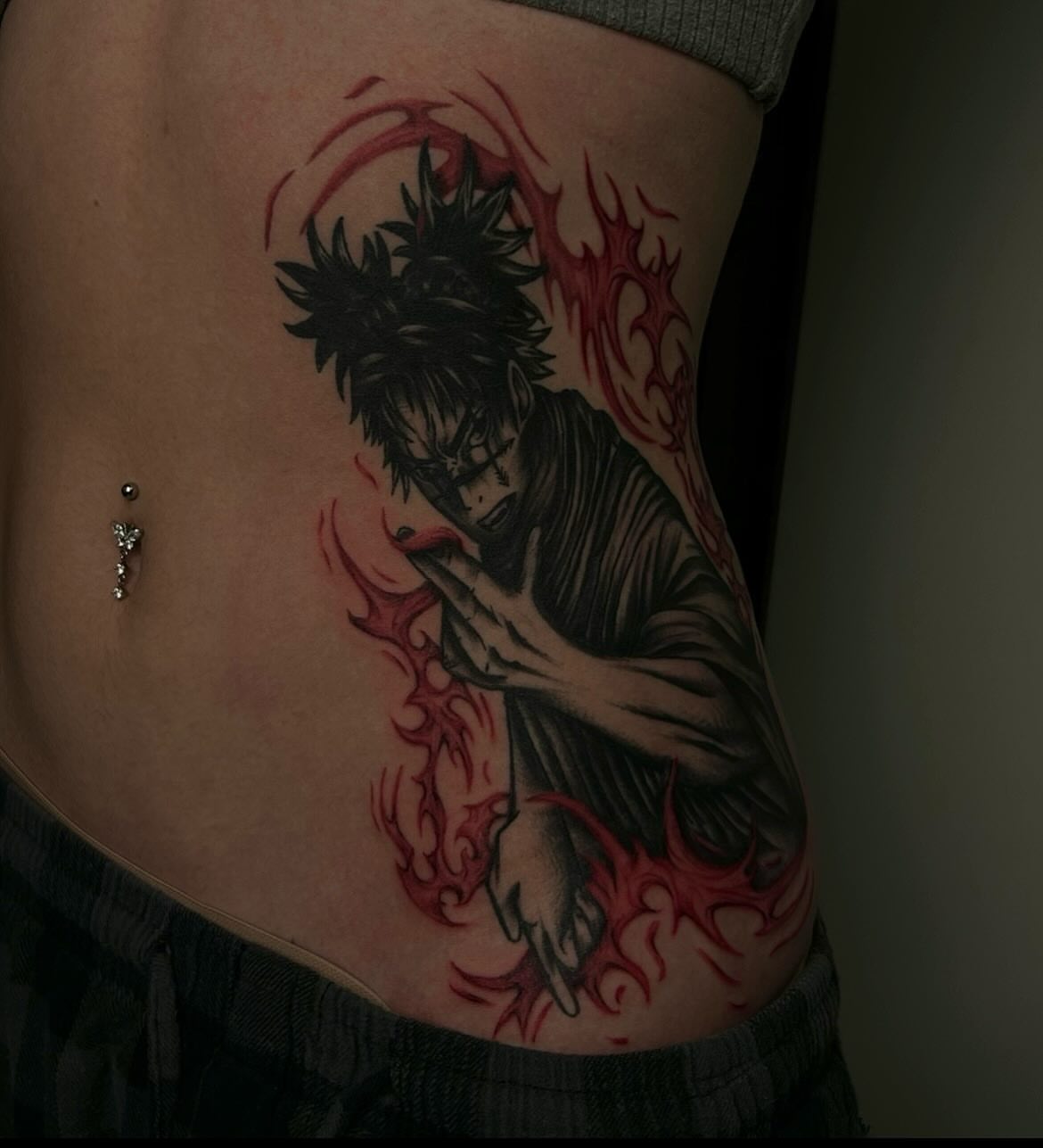 Japanese anime character anime tattoo on the torso by Kenadee