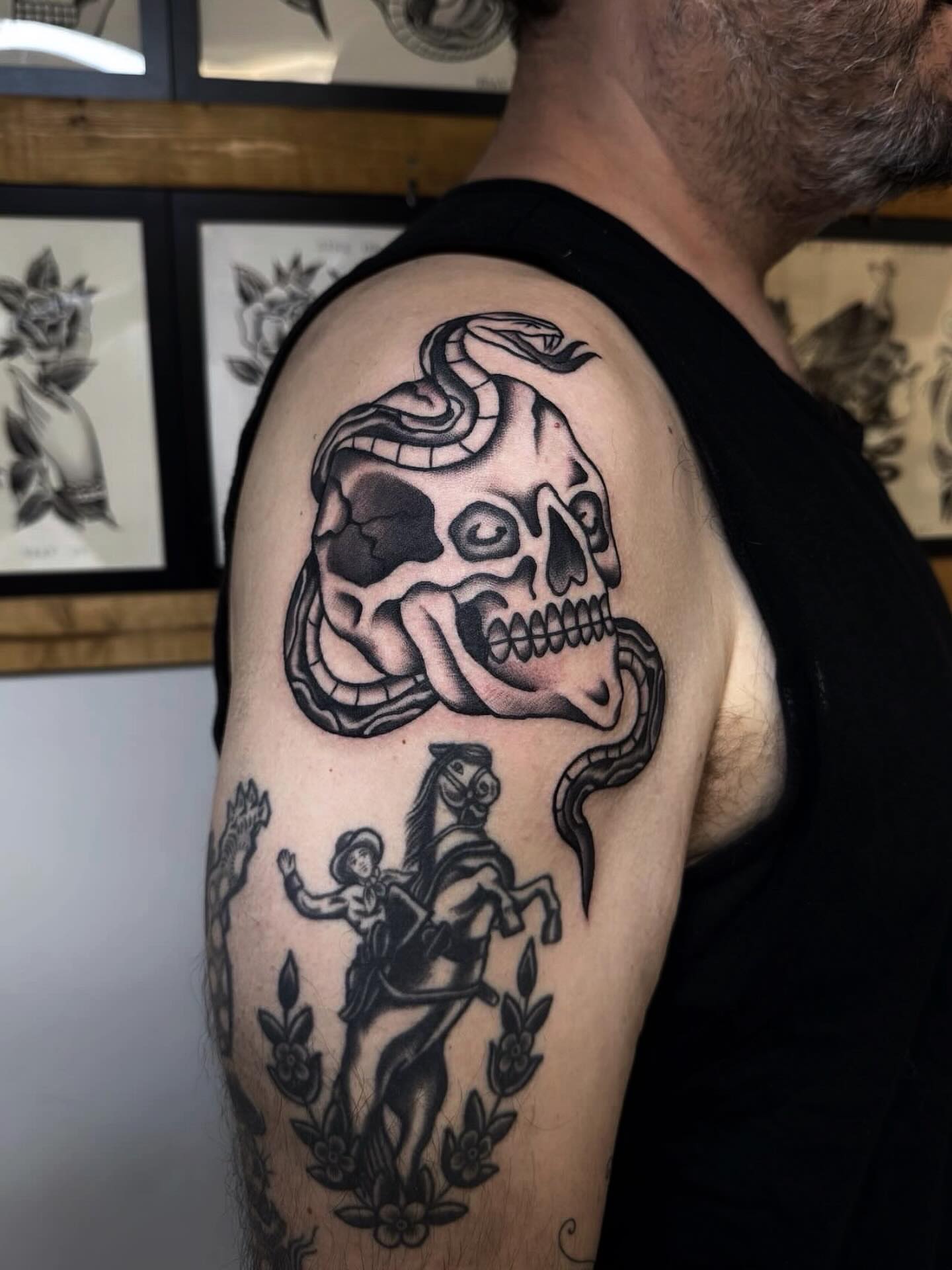 Skull and snake black and grey tattoo on the shoulder by Trav, Bayville, New Jersey