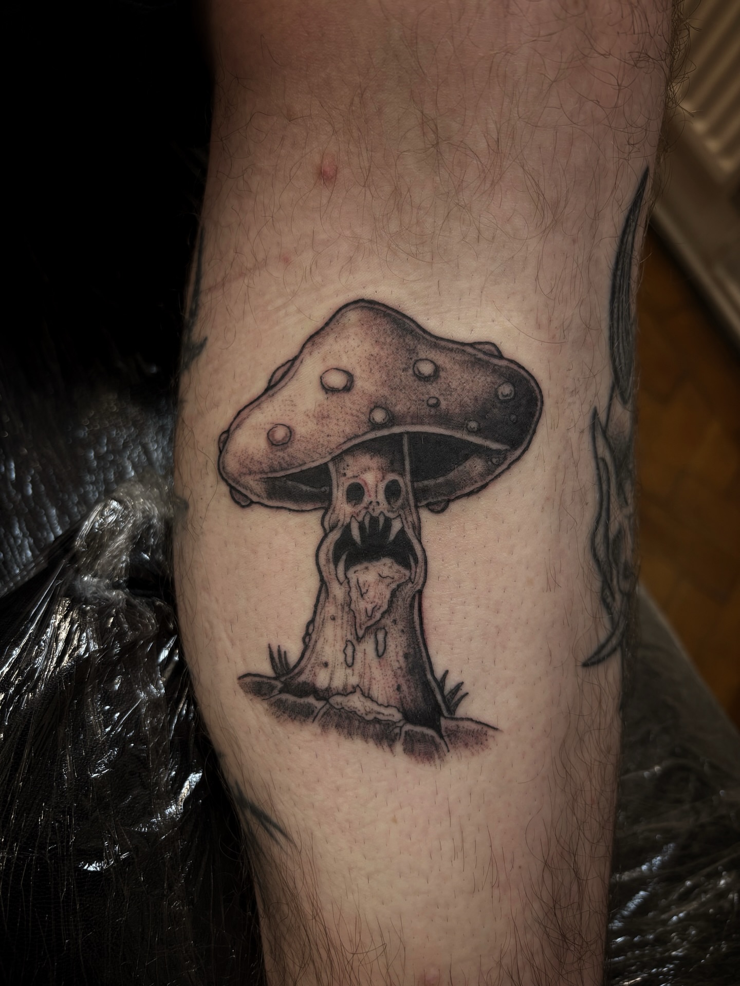 Tattoo by @scorchedbones_ — black_and_grey