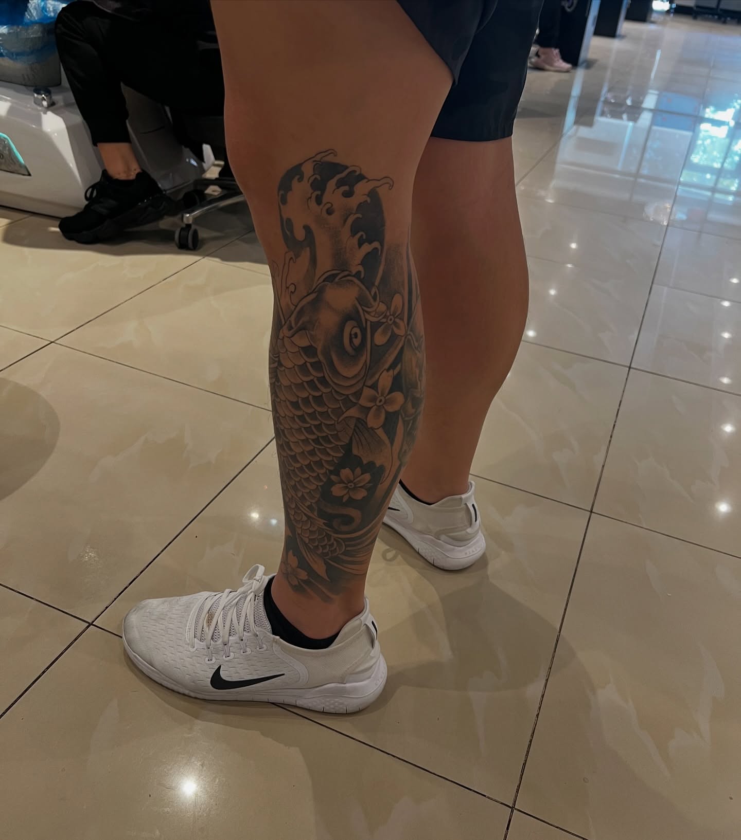 Koi fish japanese irezumi tattoo on the calf by Javier Ramos