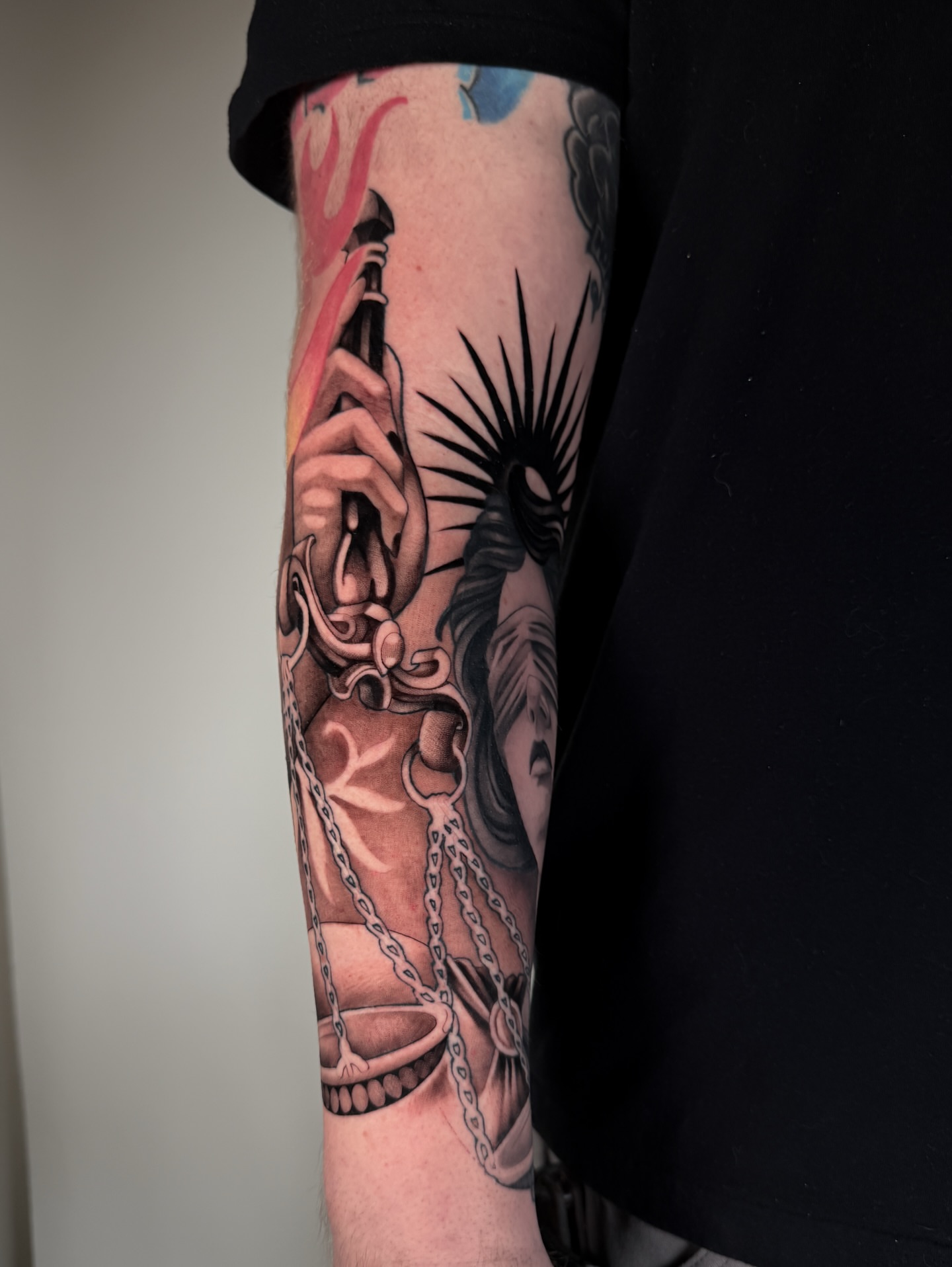 Clarinet and chains realism tattoo on the forearm by Carlos Valdes ✨ Tattoo Artist in Tampa FL
