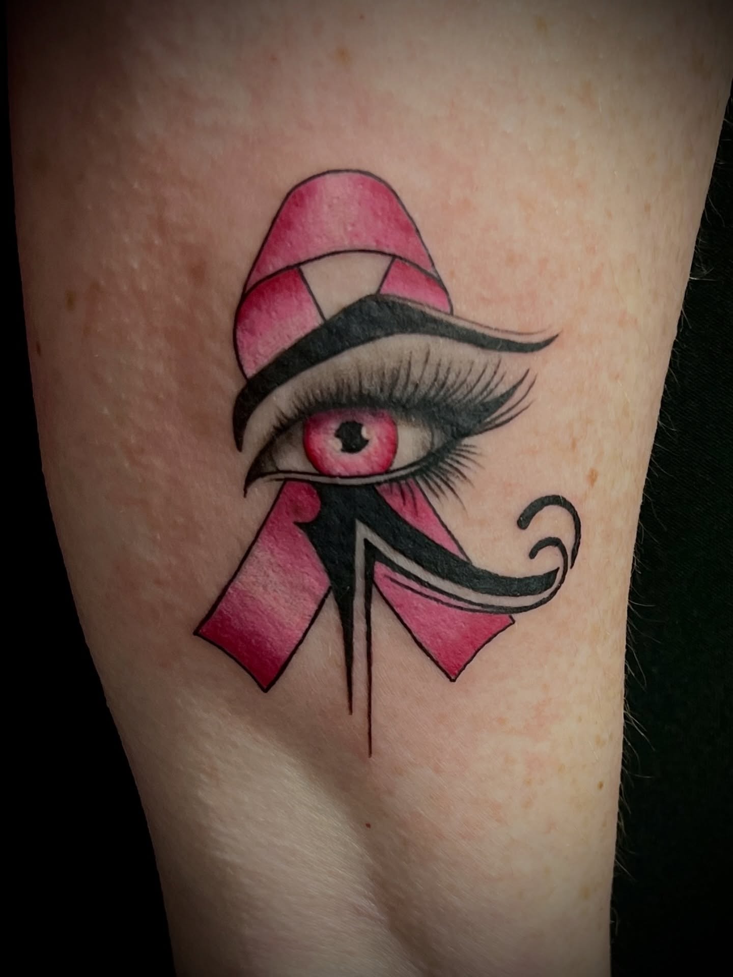 Eye with ribbon American traditional tattoo on the forearm by Vicki D Tattoo
