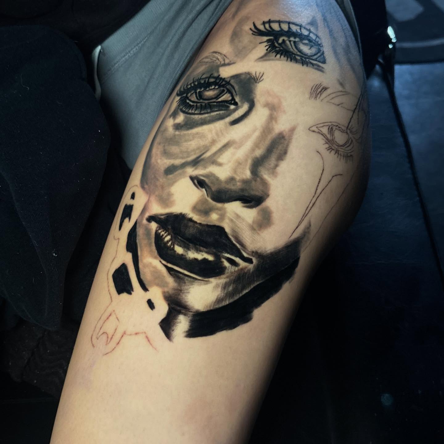 Portrait realism tattoo on the forearm by D. Davis