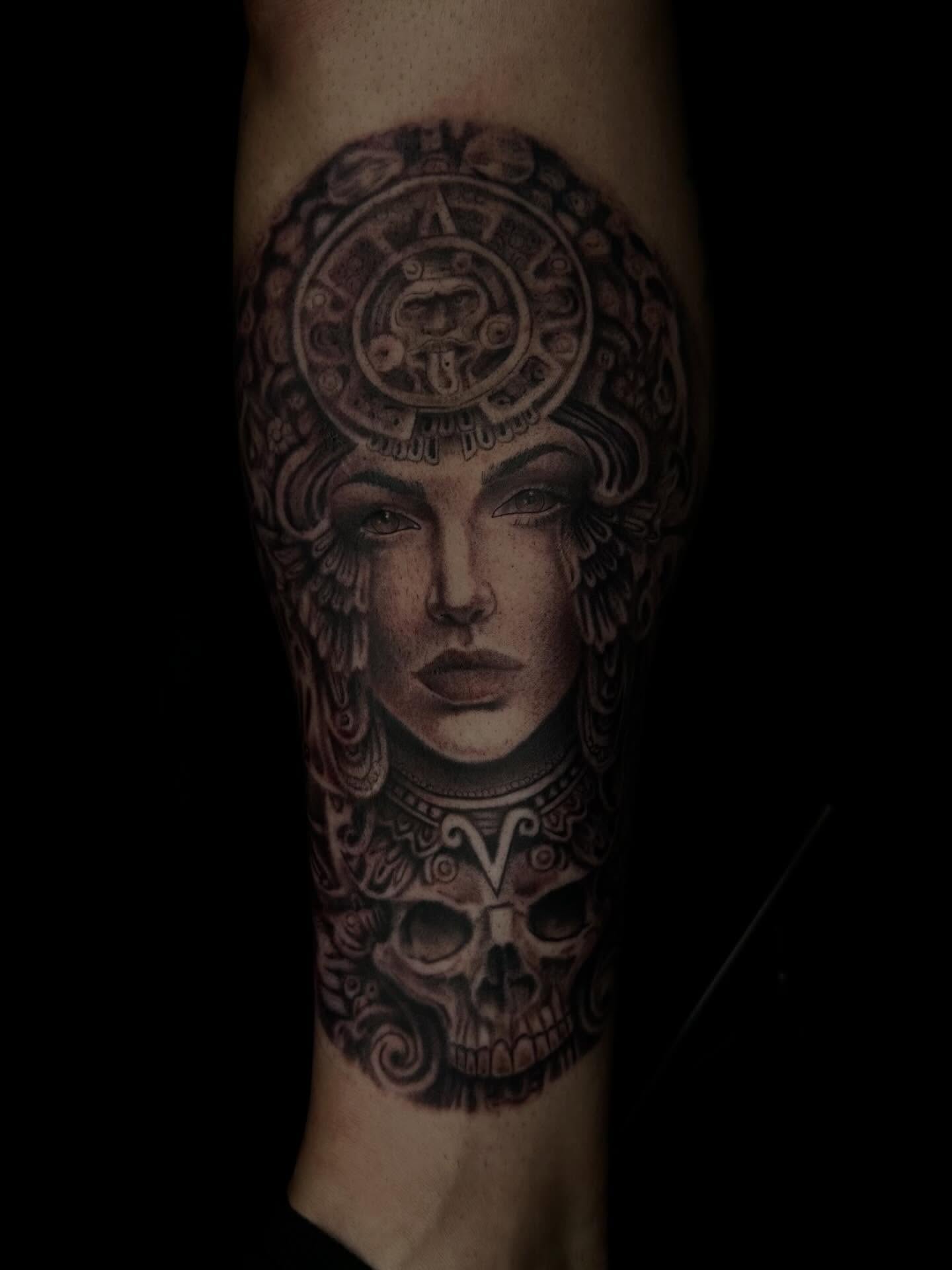 Woman with skull realism tattoo on the forearm by Jay Morales