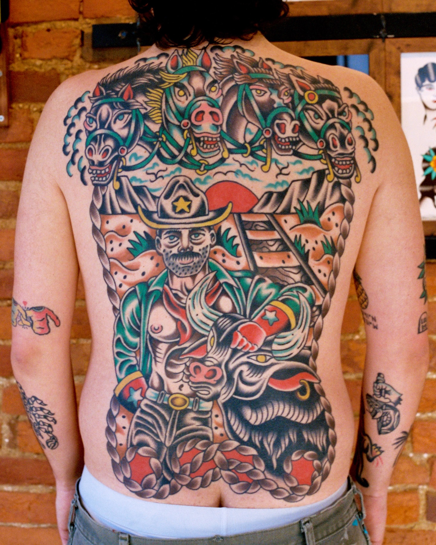 Cowboy and horses American traditional tattoo on the back by Cullen Bleser Quinn