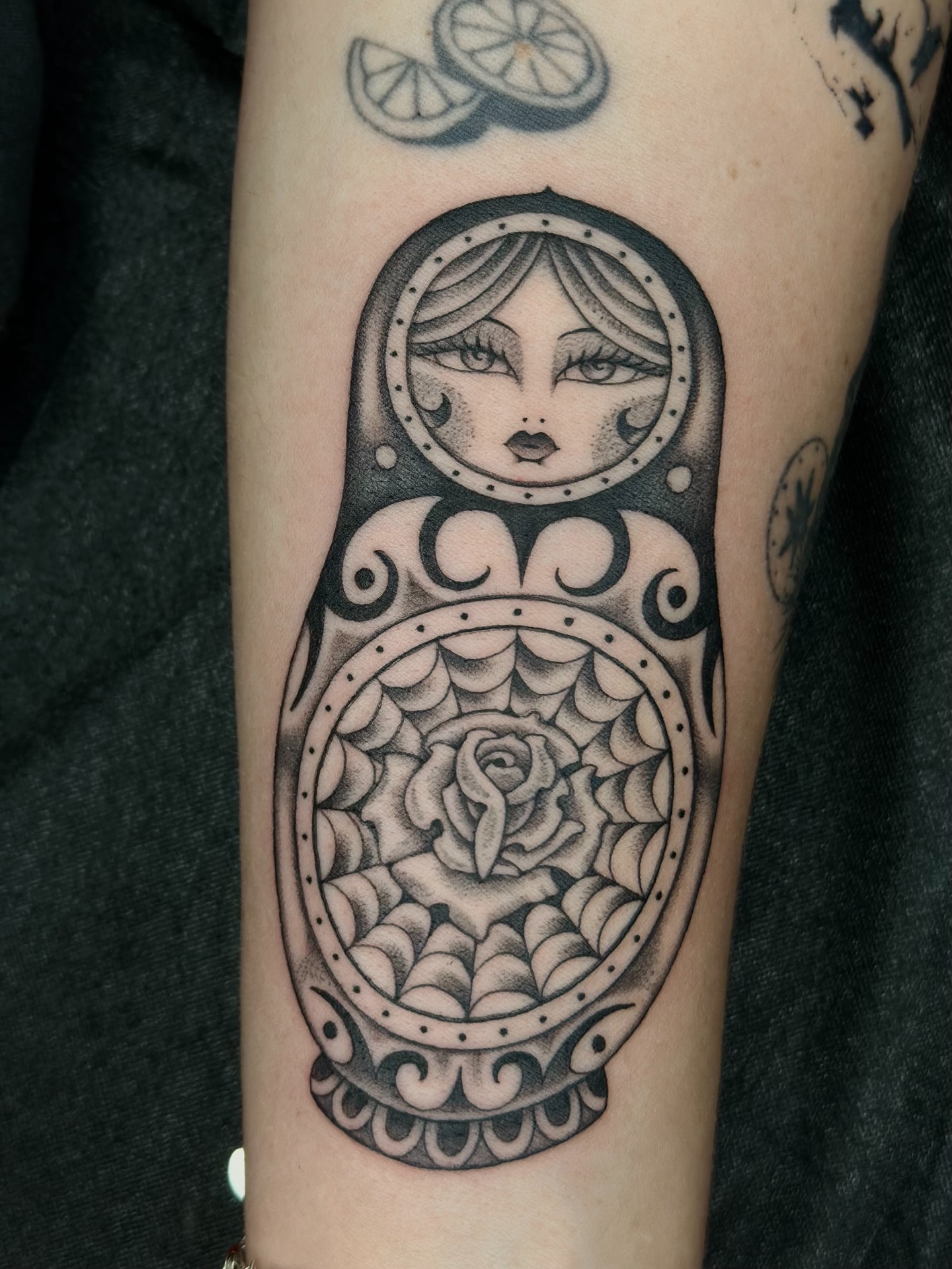 Nested doll dotwork tattoo on the forearm by Lauryn Jenesis